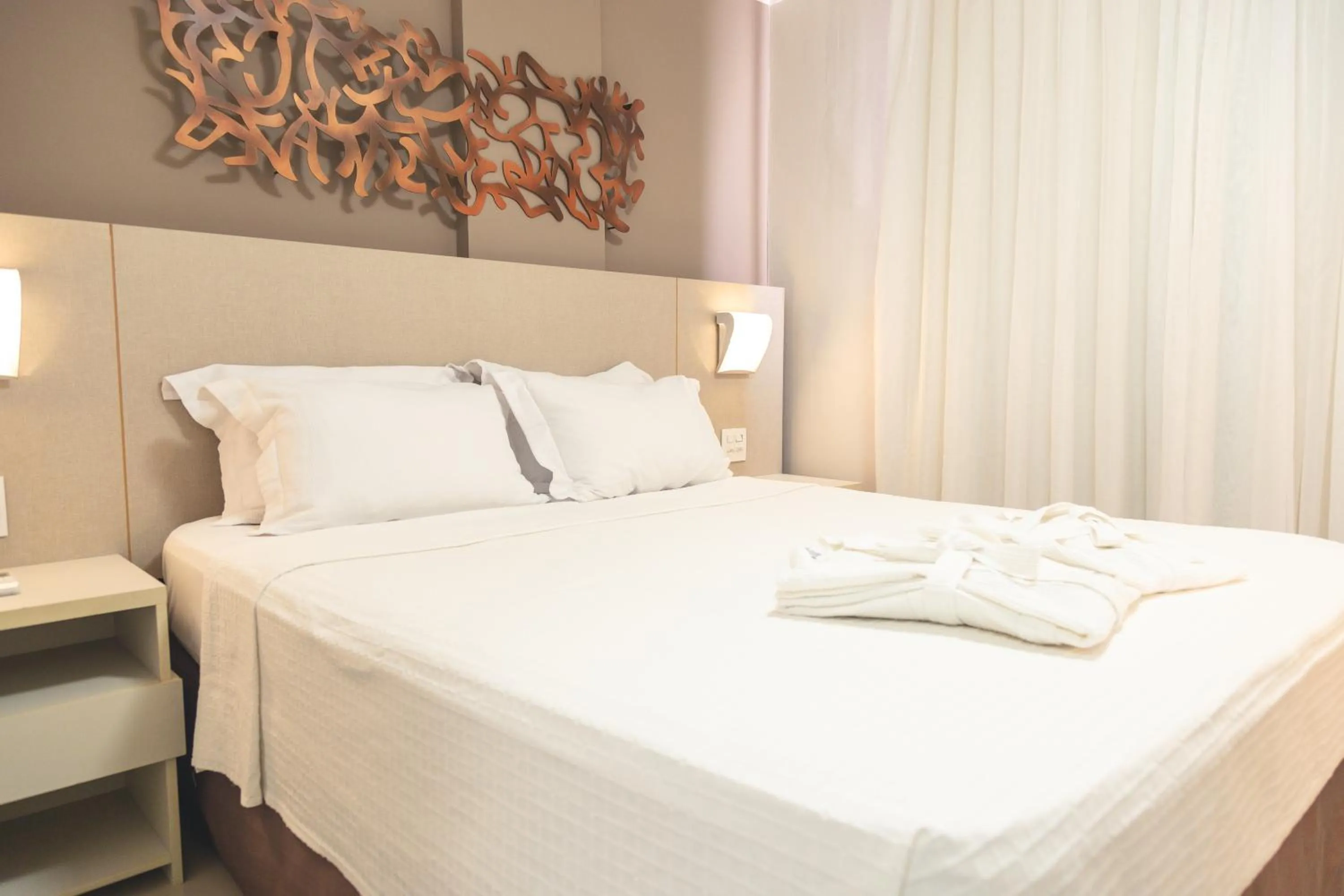 Bed in Lagoon Prime Hotel