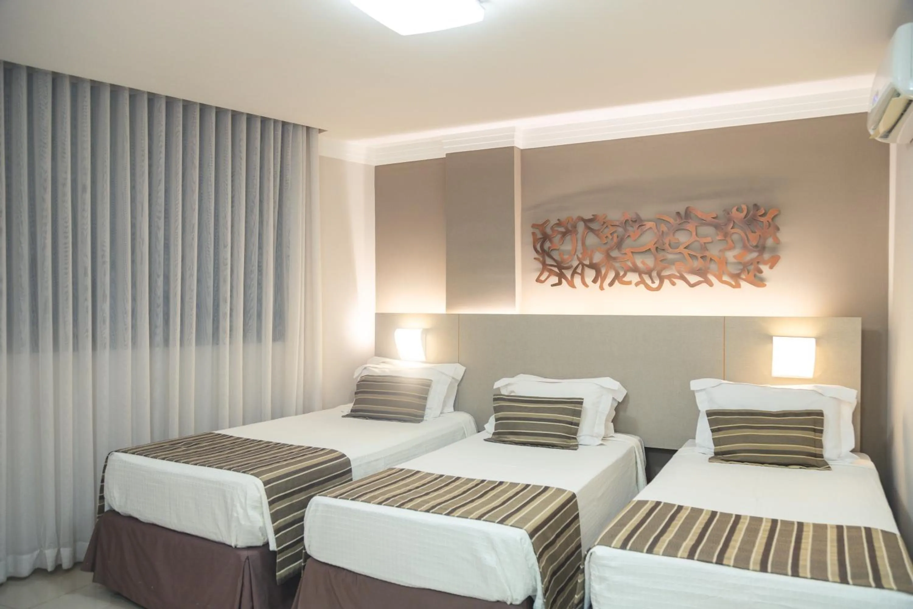 Bed in Lagoon Prime Hotel