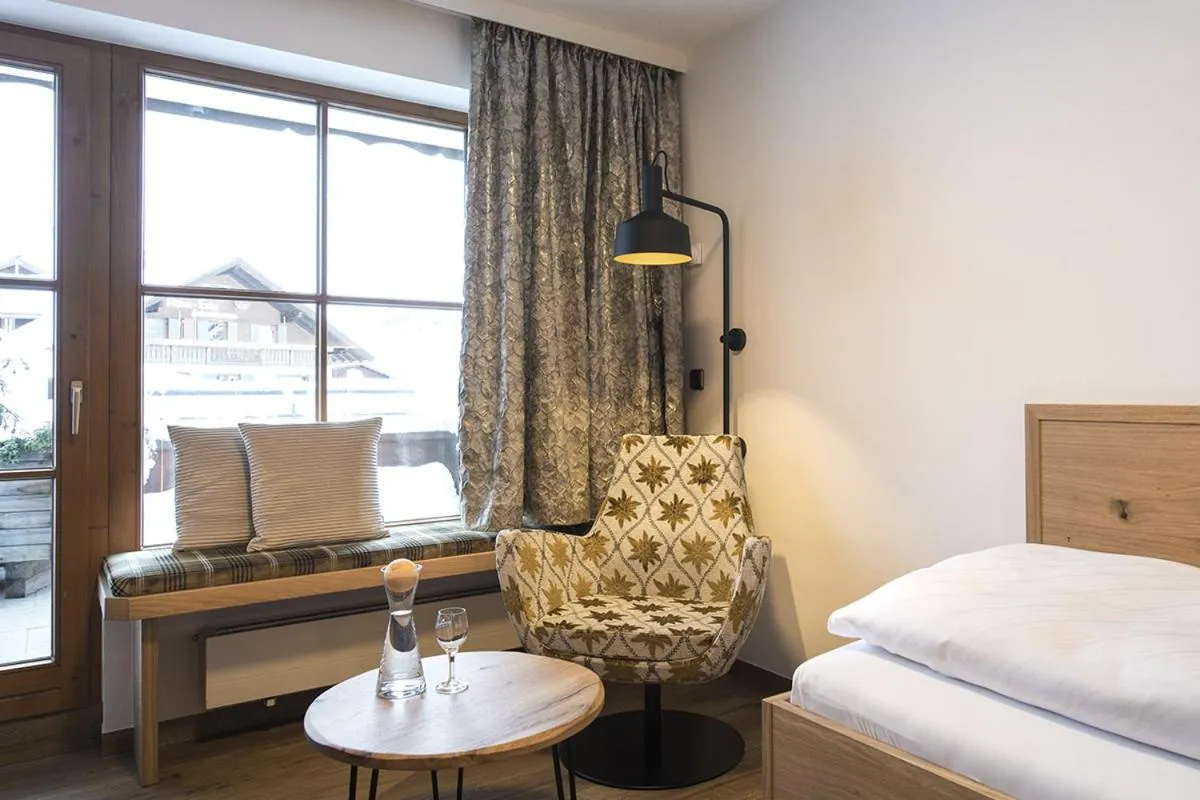 Seating area, Bed in Wohlfühlhotel Berwanger Hof