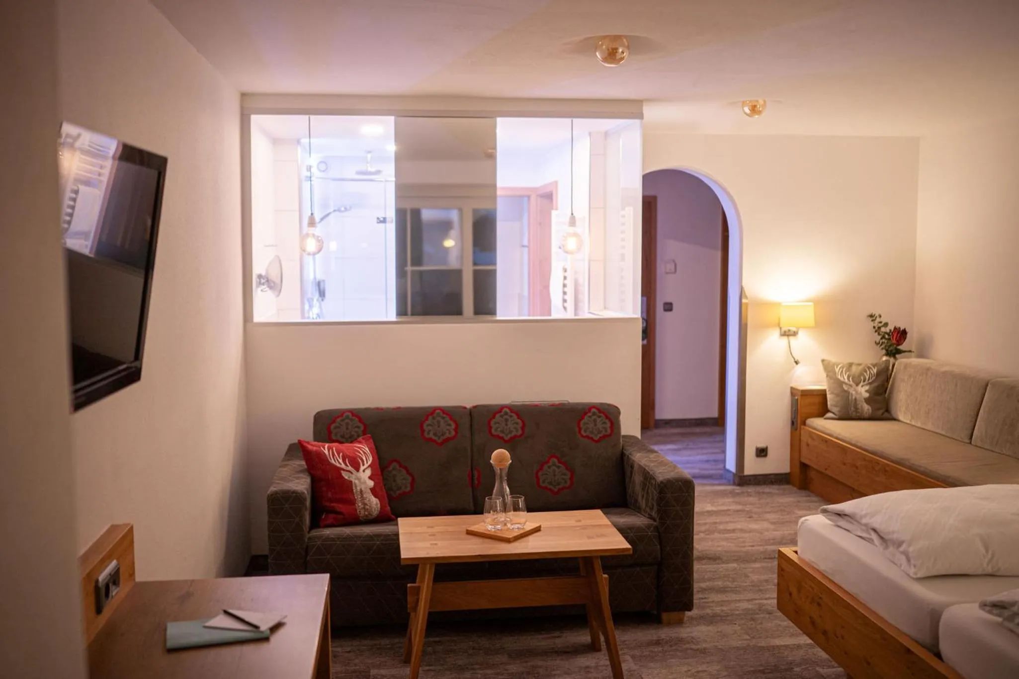 Seating area, Bed in Wohlfühlhotel Berwanger Hof