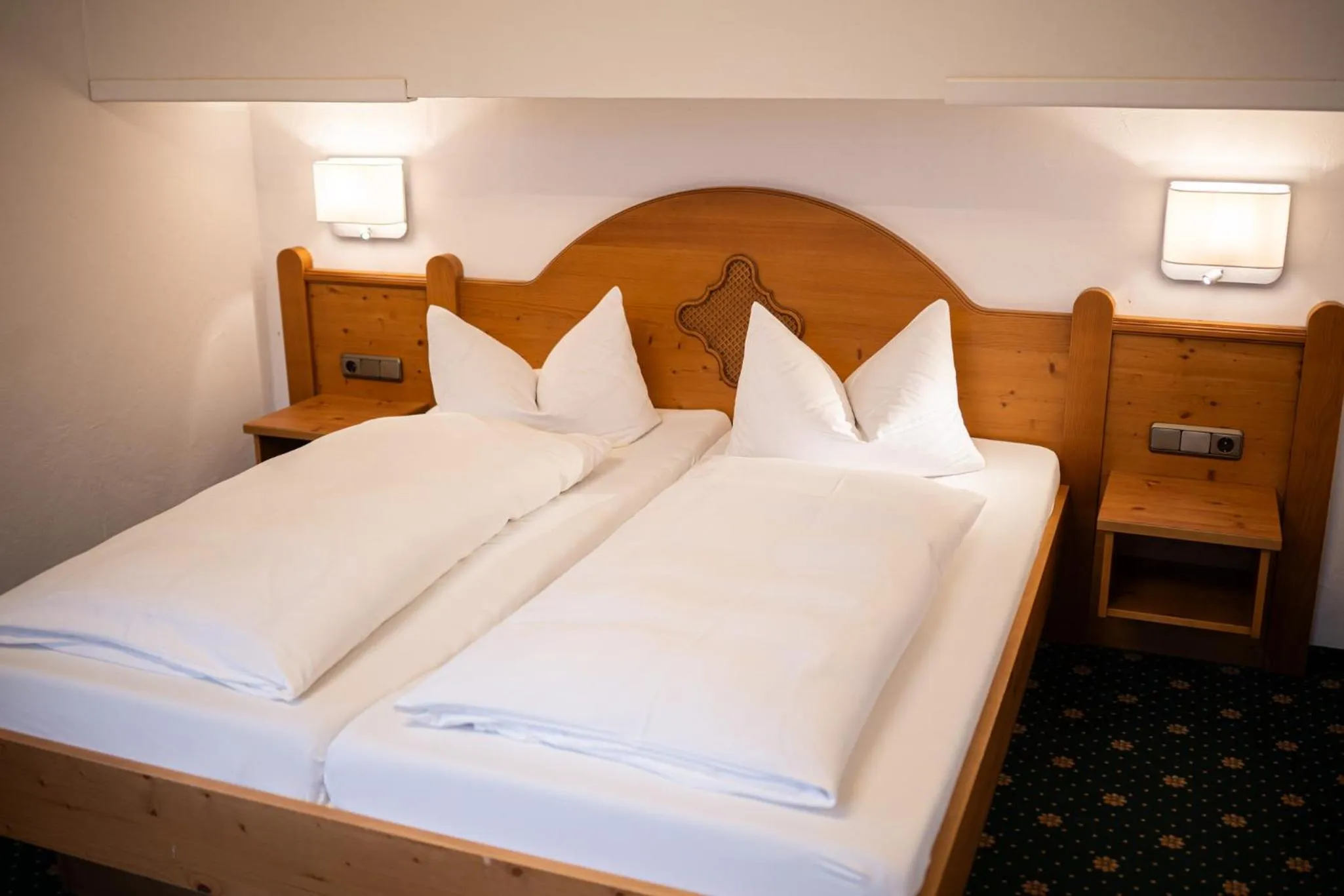 Bed in Wohlfühlhotel Berwanger Hof