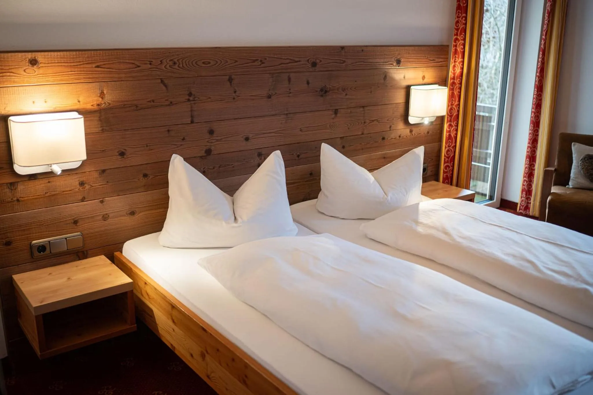 Bed in Wohlfühlhotel Berwanger Hof