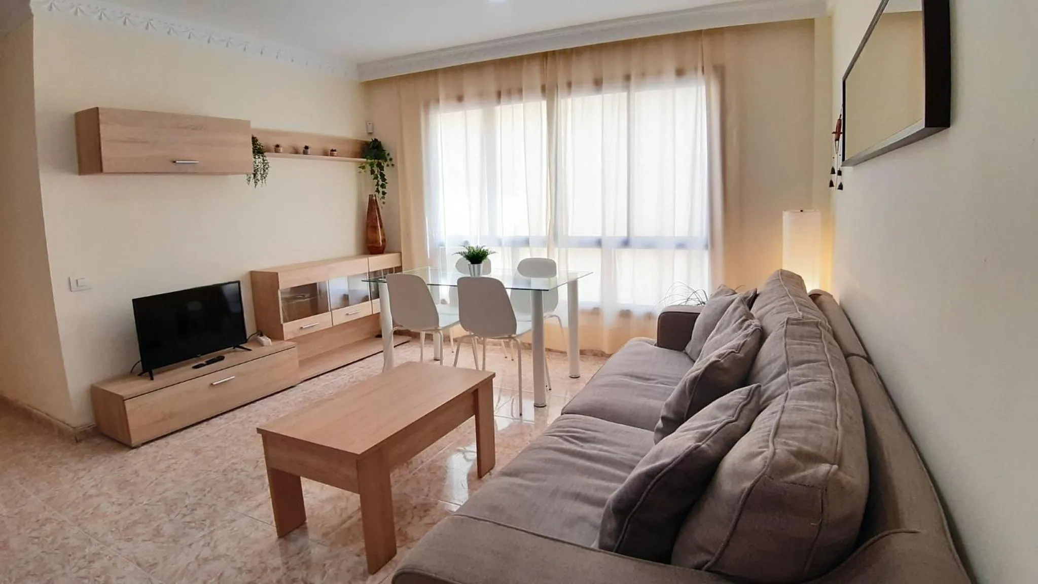 Communal lounge/ TV room in Charming 3-Bedroom Apartment in Corralejo, Lanzarote