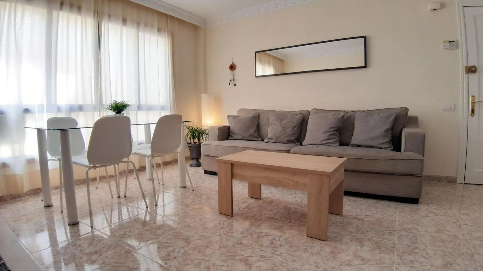Communal lounge/ TV room in Charming 3-Bedroom Apartment in Corralejo, Lanzarote