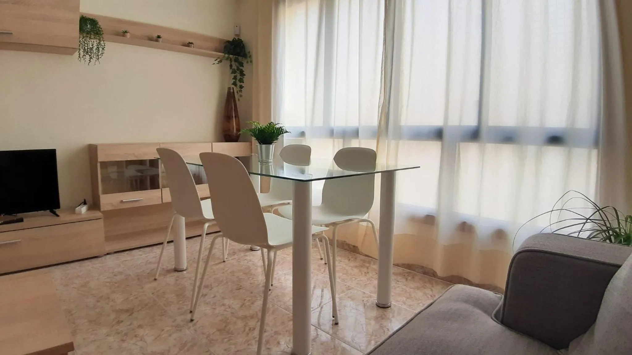 Communal lounge/ TV room in Charming 3-Bedroom Apartment in Corralejo, Lanzarote