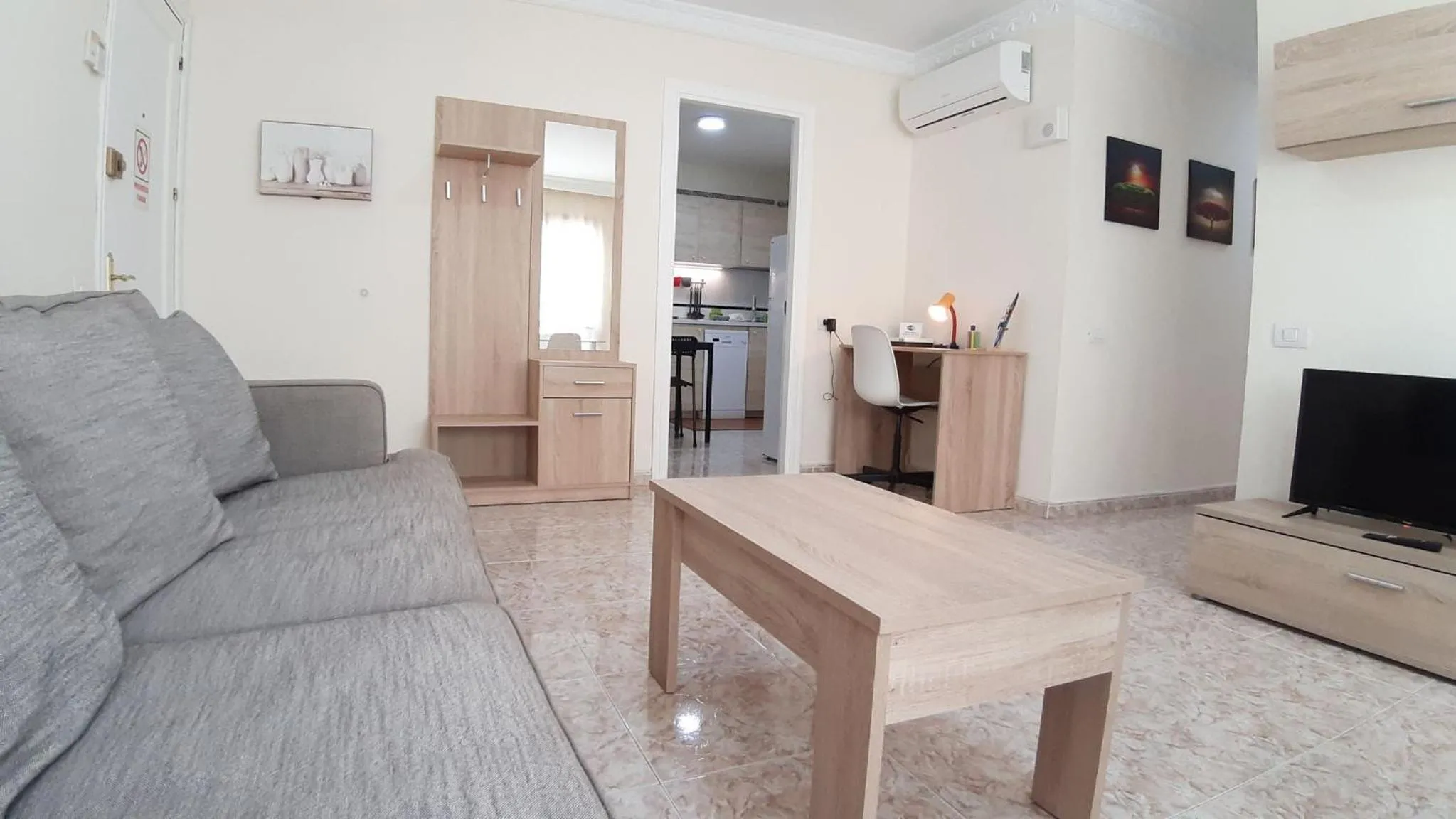 Communal lounge/ TV room in Charming 3-Bedroom Apartment in Corralejo, Lanzarote