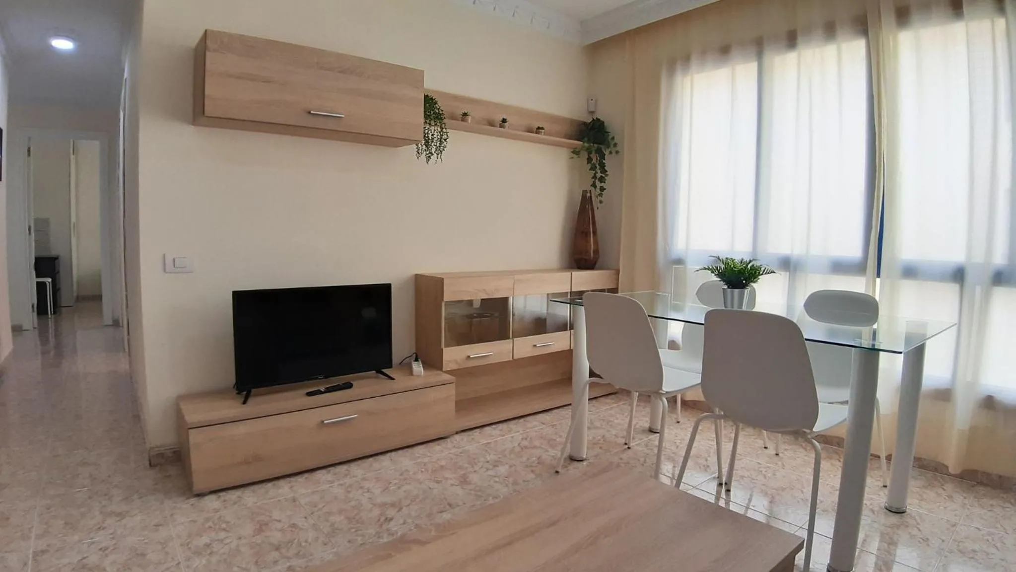 Communal lounge/ TV room in Charming 3-Bedroom Apartment in Corralejo, Lanzarote