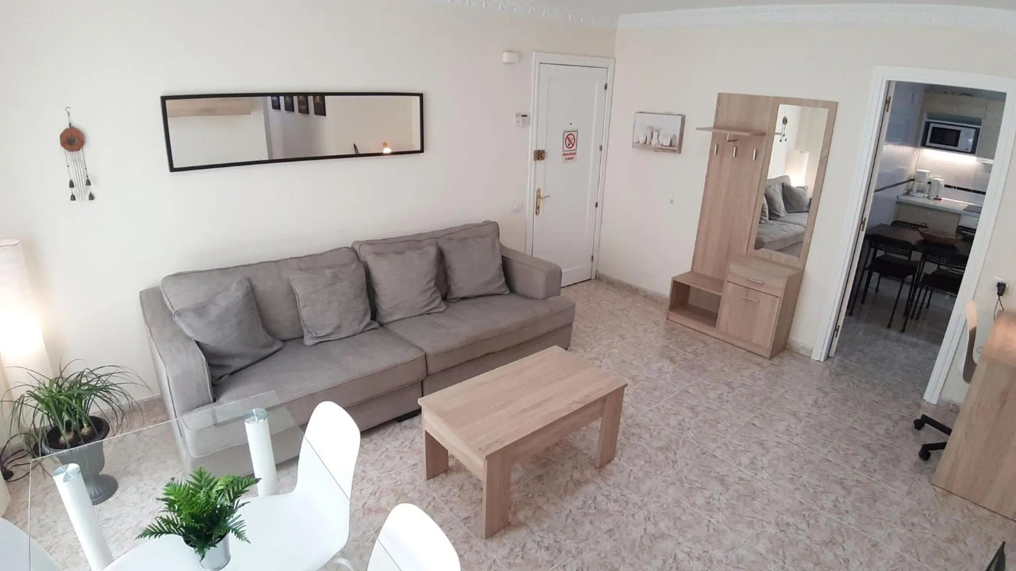 Communal lounge/ TV room in Charming 3-Bedroom Apartment in Corralejo, Lanzarote