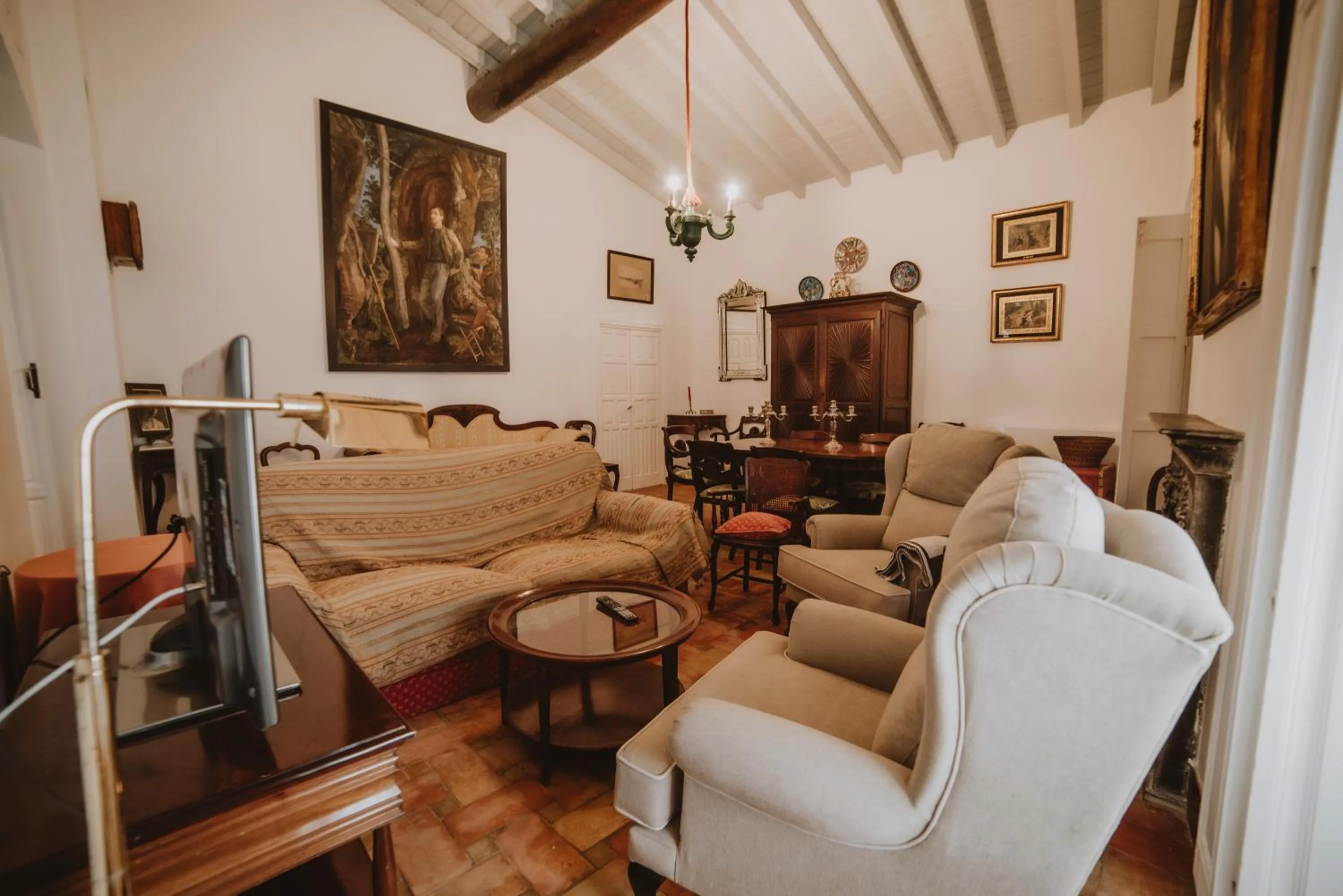 Communal lounge/ TV room in Posada La Casa Del Pintor