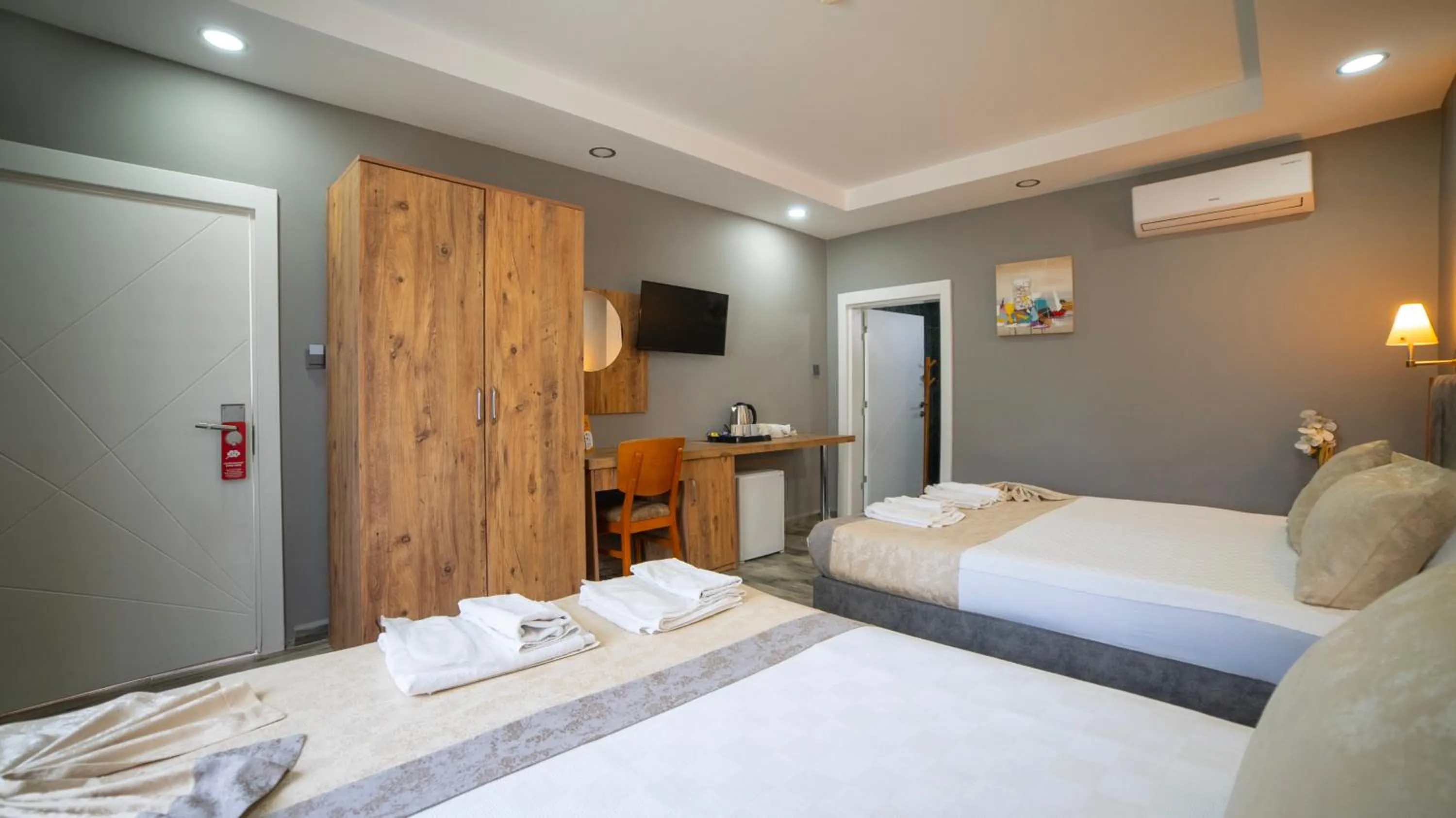 Bed in La Cactus Boutique Hotel