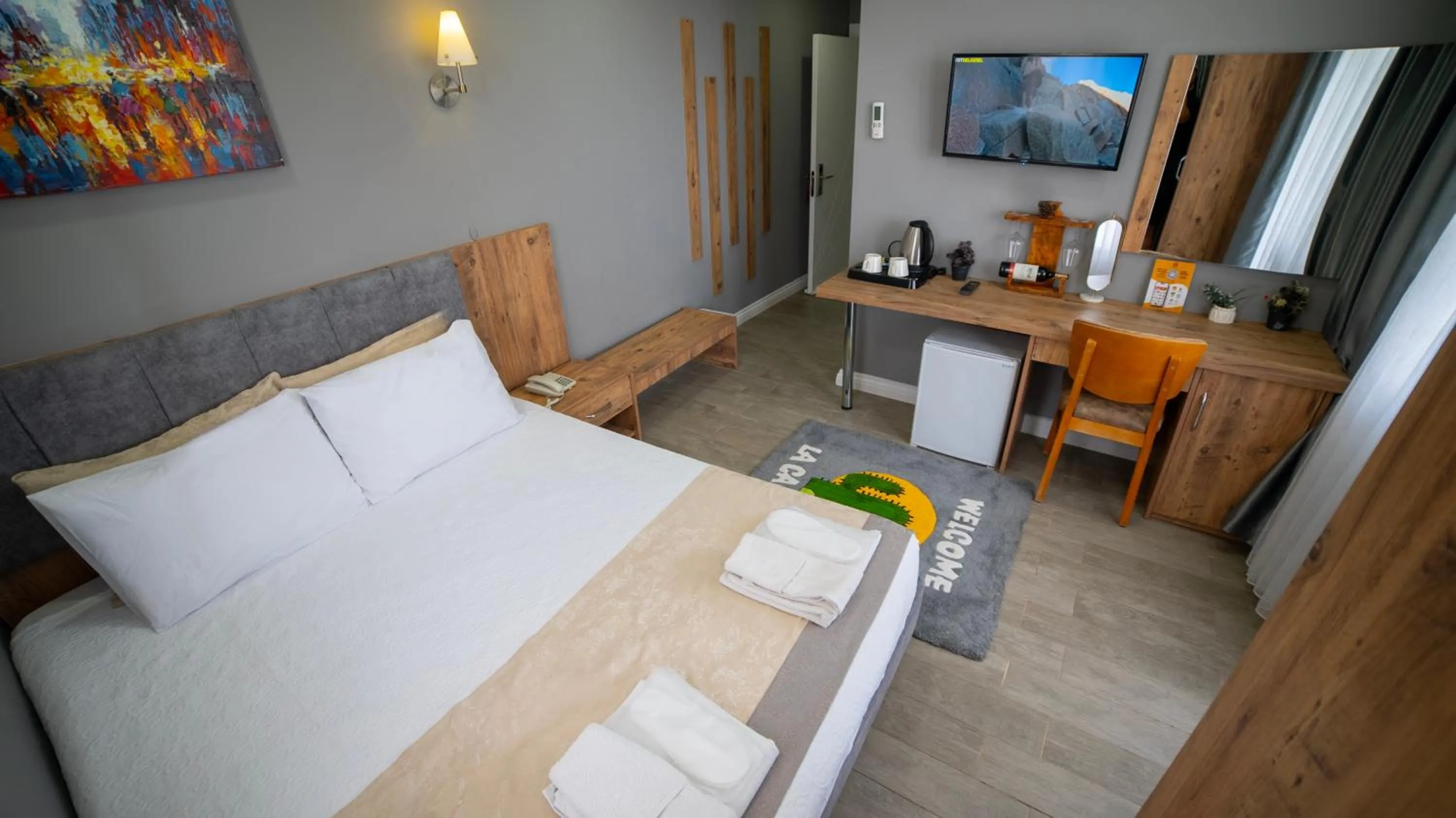 Bed in La Cactus Boutique Hotel