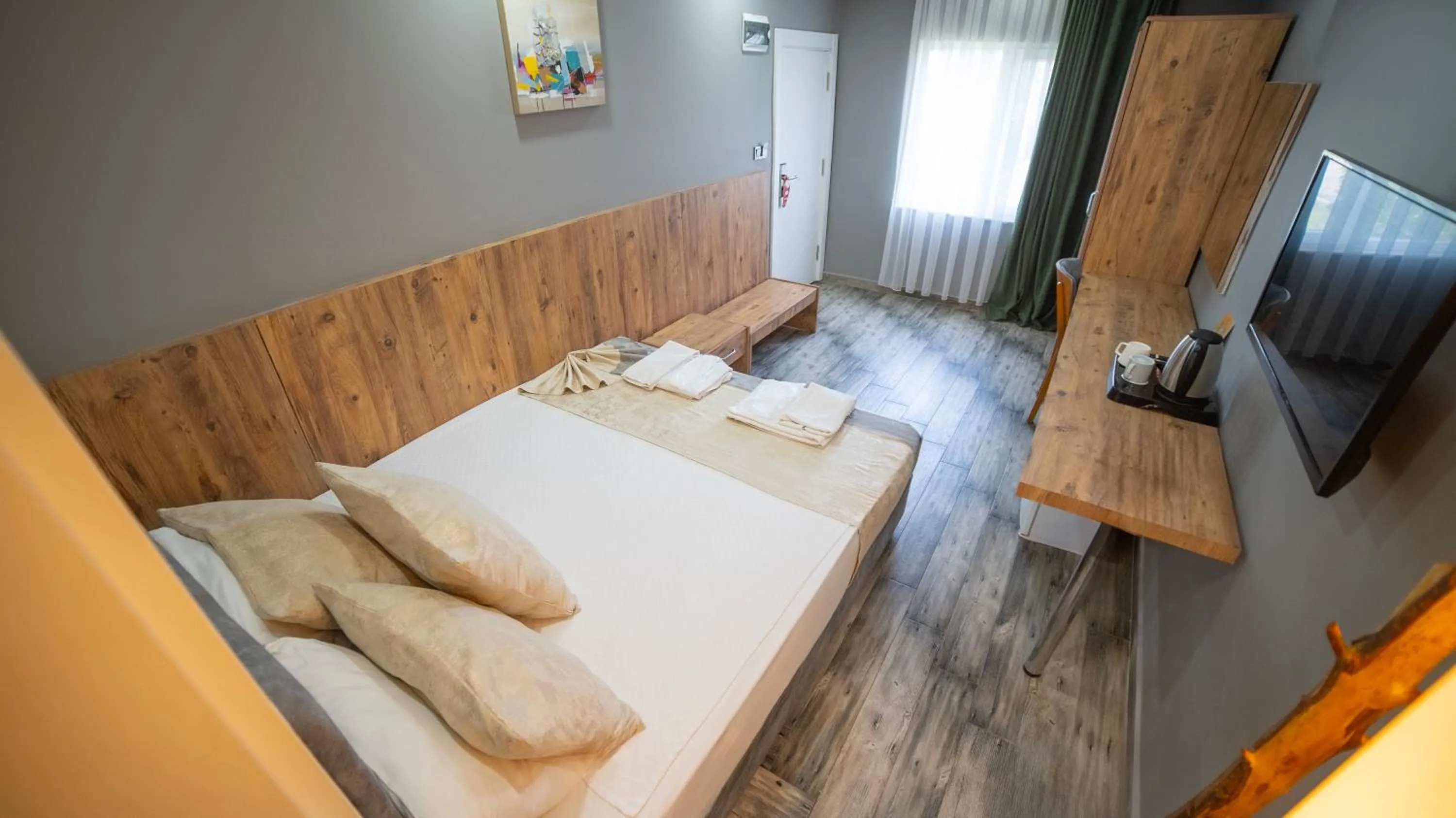 Bed in La Cactus Boutique Hotel