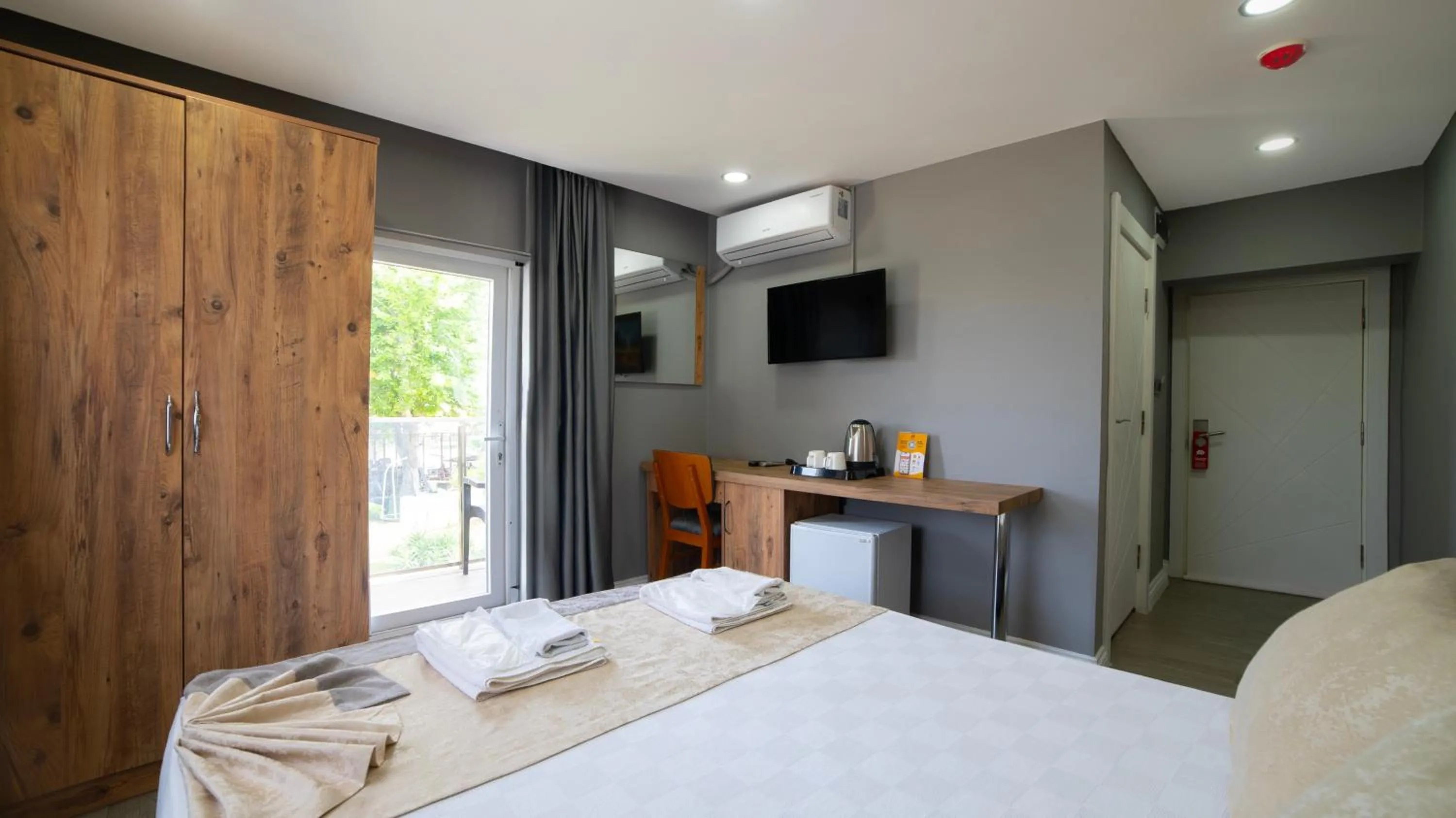 Bed in La Cactus Boutique Hotel