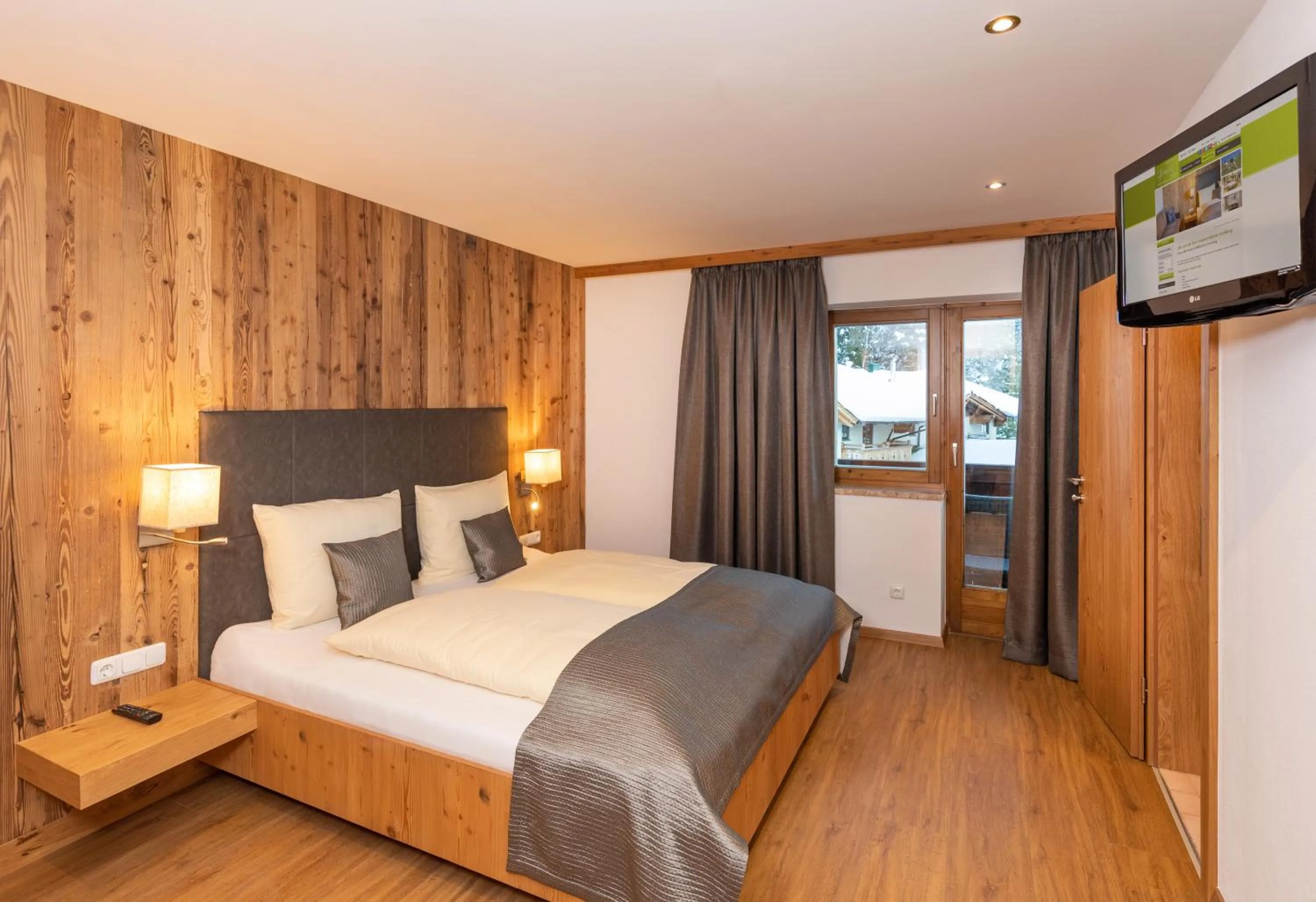 Bed in Das Grünholz Aparthotel