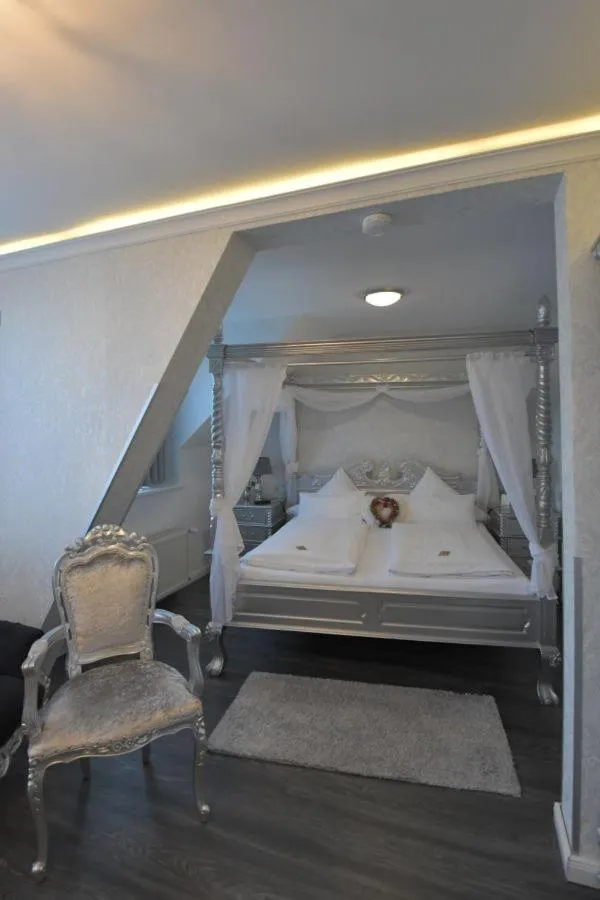Photo of the whole room, Bed in Boutiquehotel Villa Rosenhof