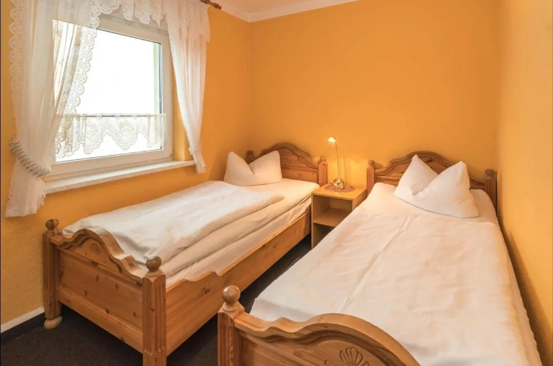 Photo of the whole room, Bed in Landhotel Weingut Schulze