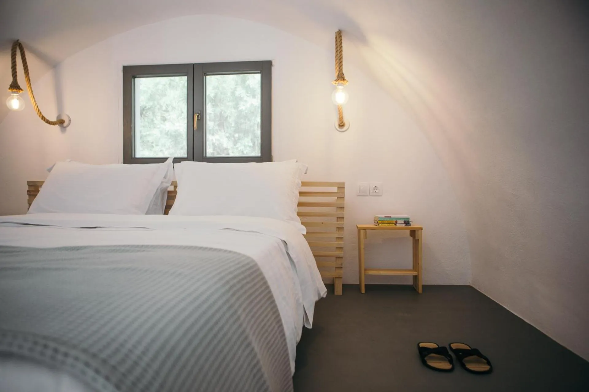 Bed in Exi Sea Side Suites