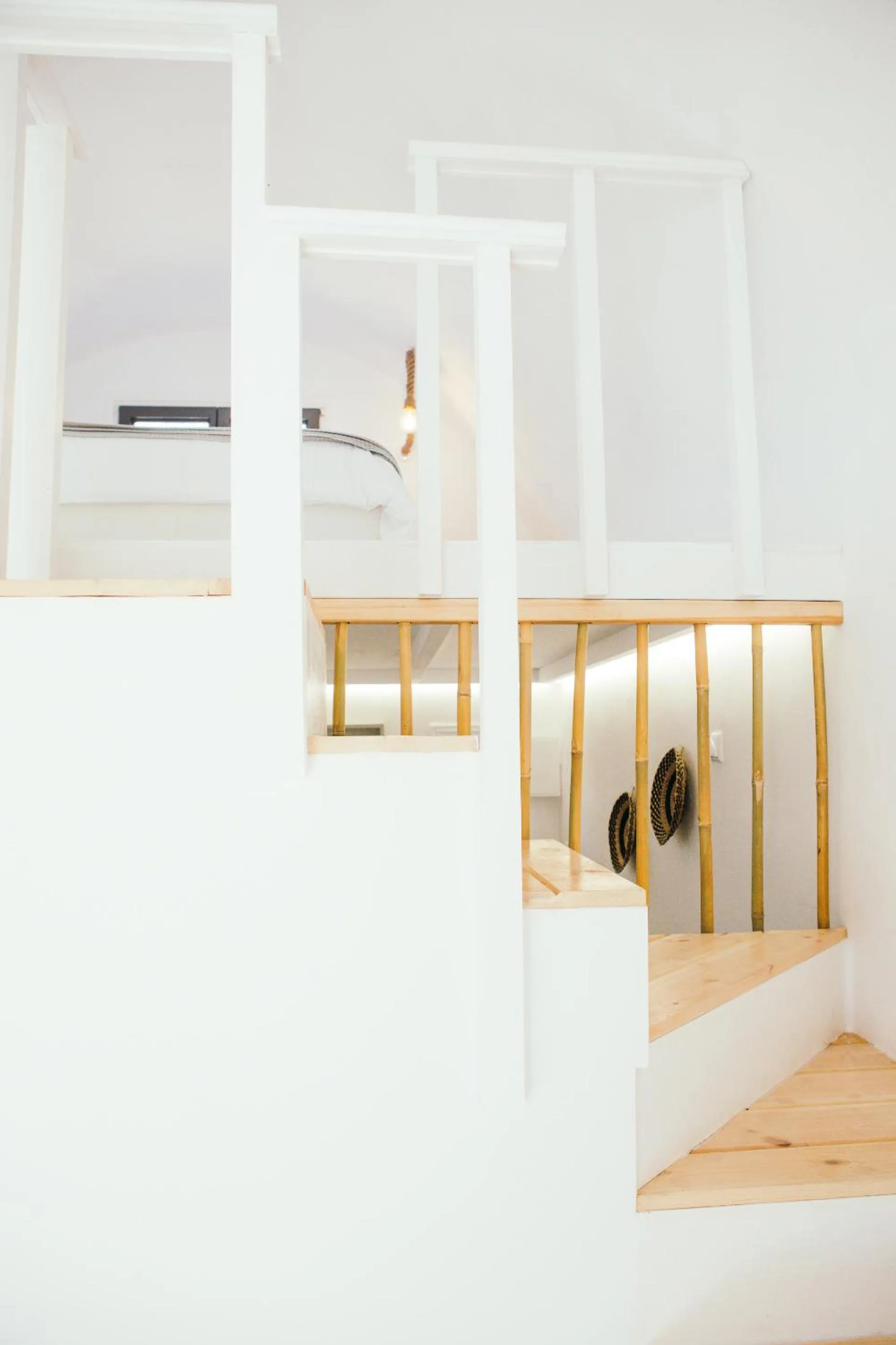 Bed in Exi Sea Side Suites