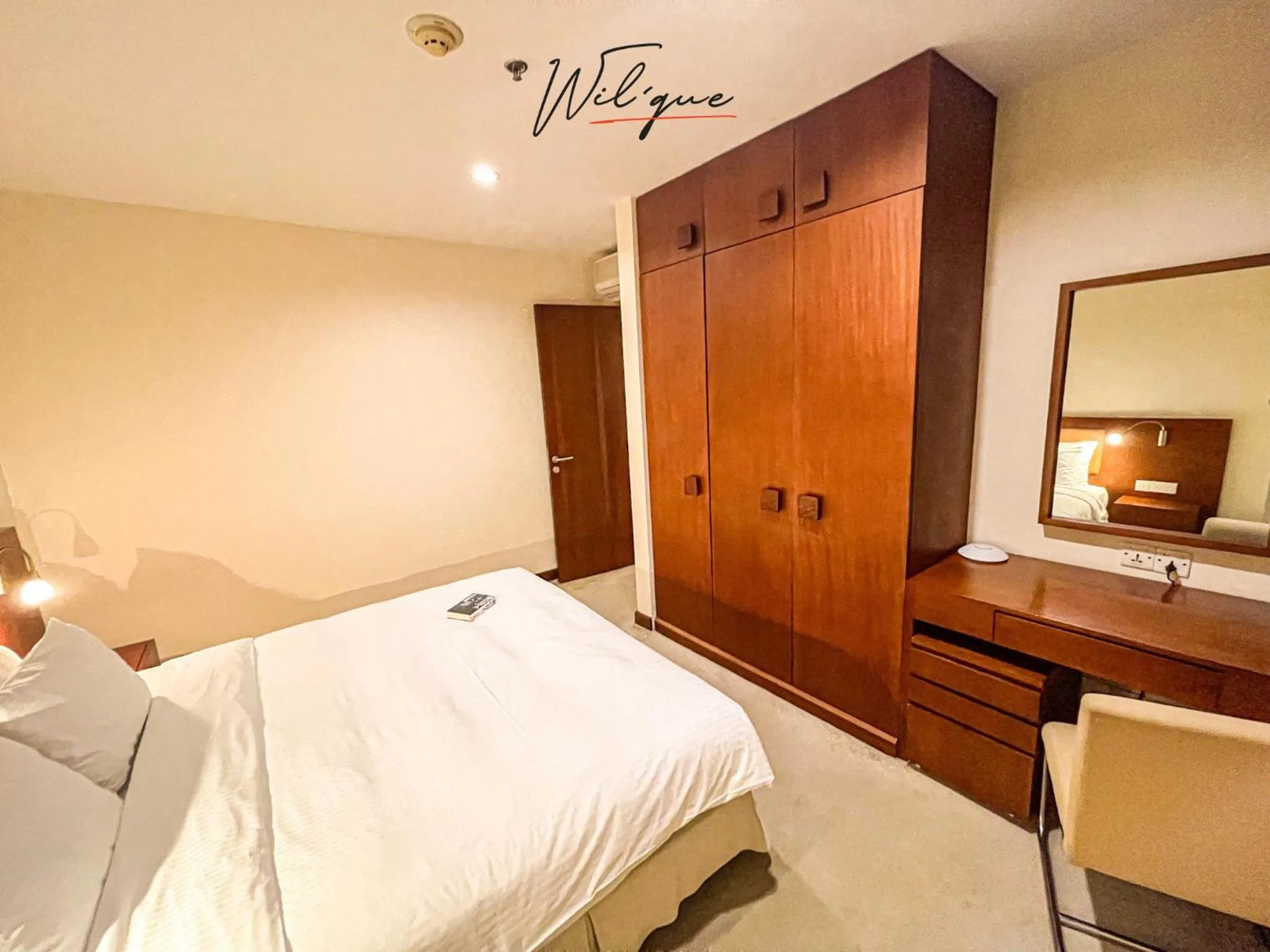 Bed in Wil'que Westlake Hotel & Residences