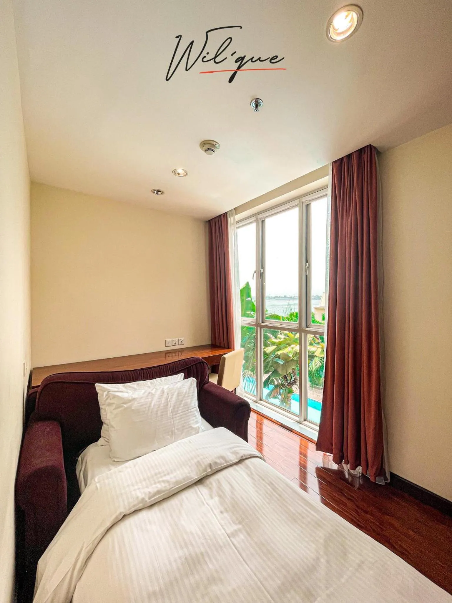 Bed in Wil'que Westlake Hotel & Residences