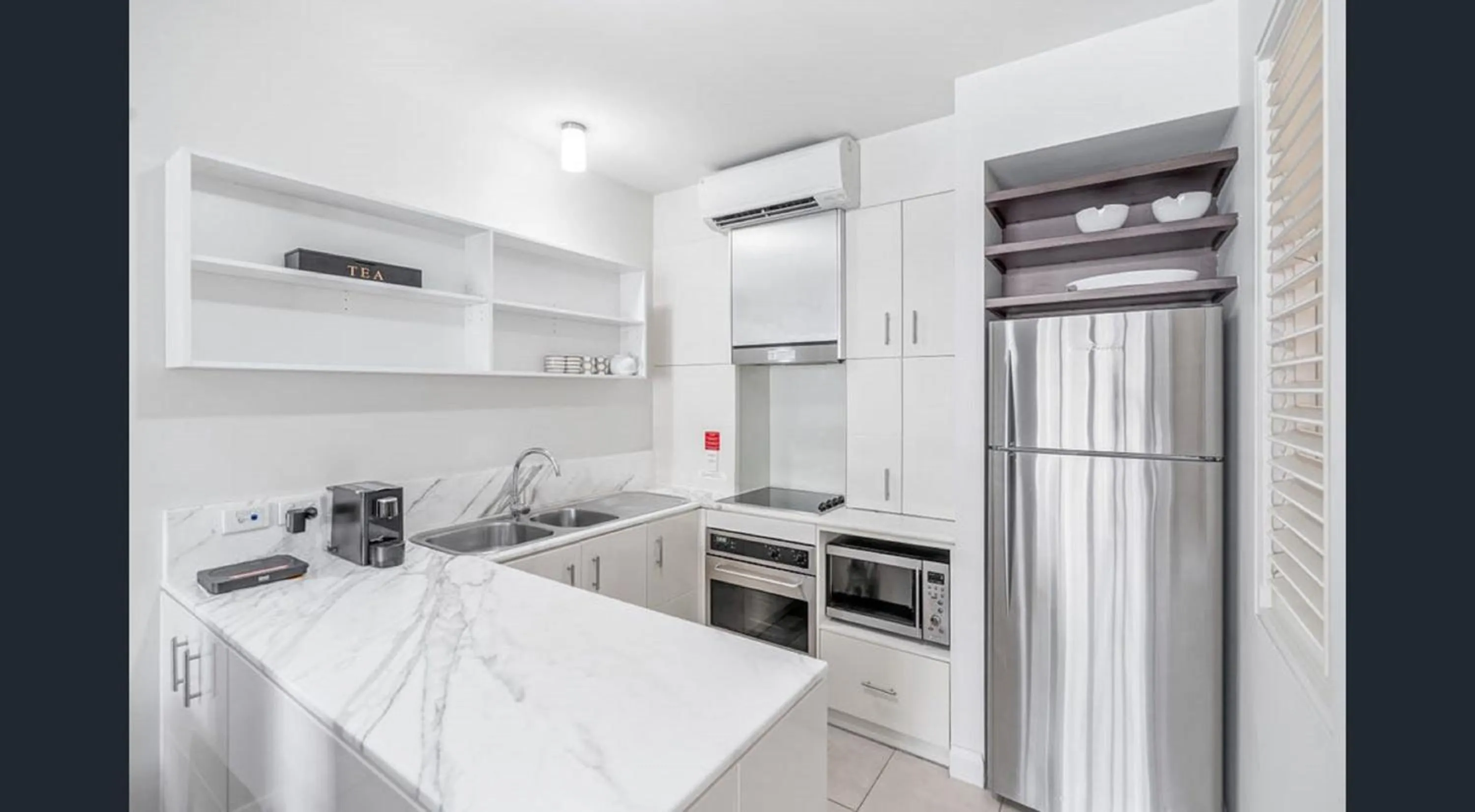 Kitchen or kitchenette in Beach Club Palm Cove 2 Bedroom Luxury Penthouse