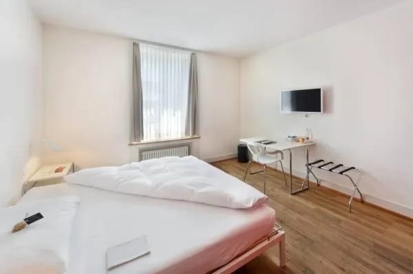 Bed in Hotel im Schlosspark