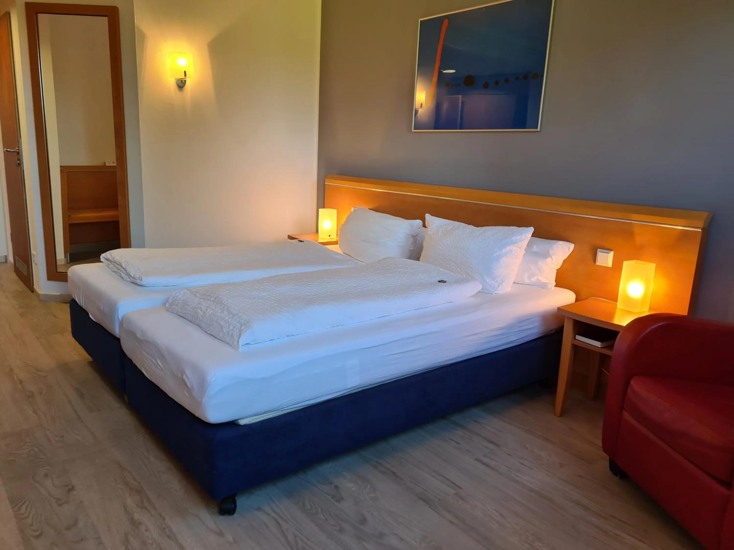 Bed in Hotel Aquamarin