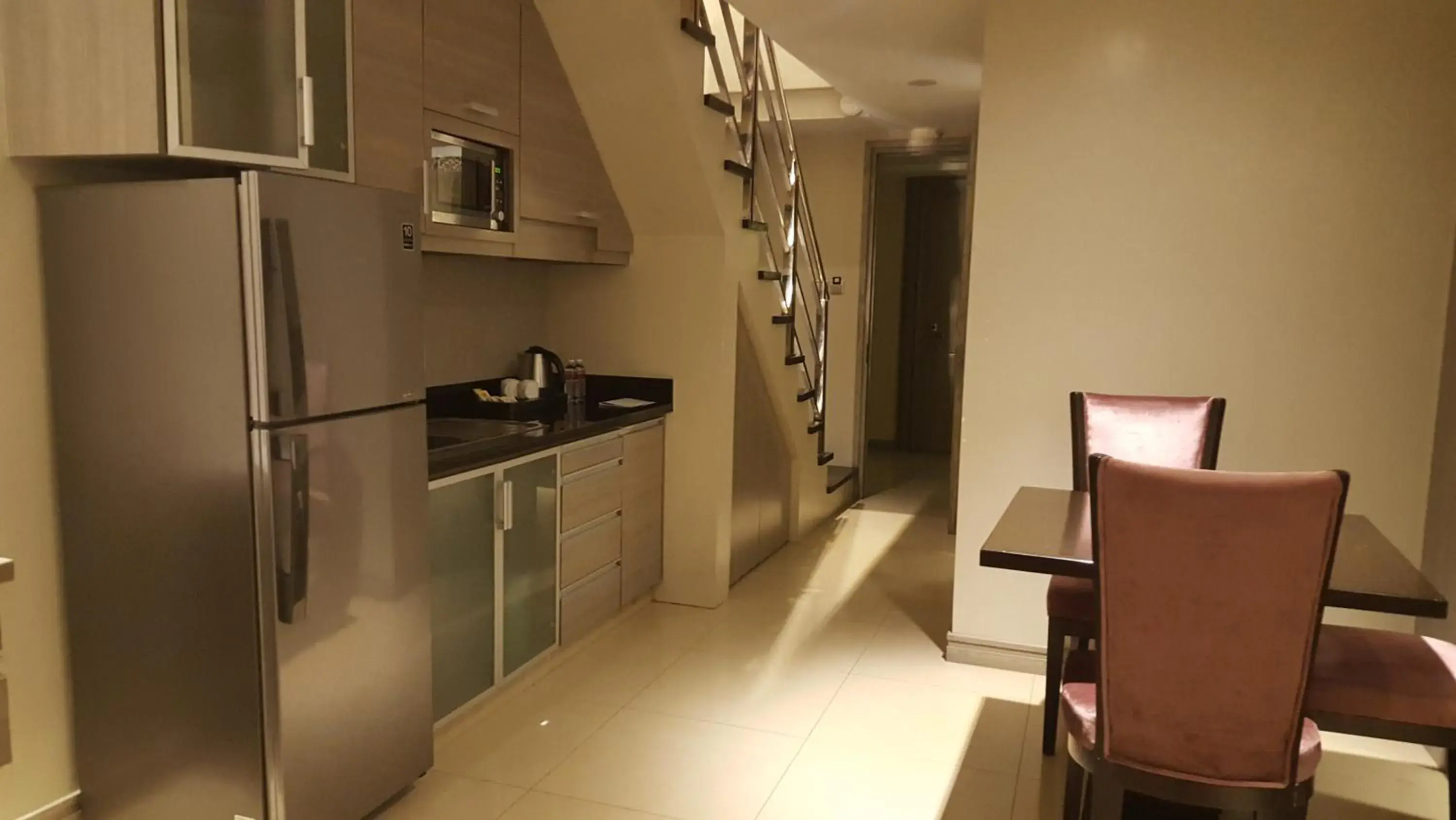 Kitchen or kitchenette in Prime Asia Hotel Kitchen or kitchenette in Prime Asia Hotel