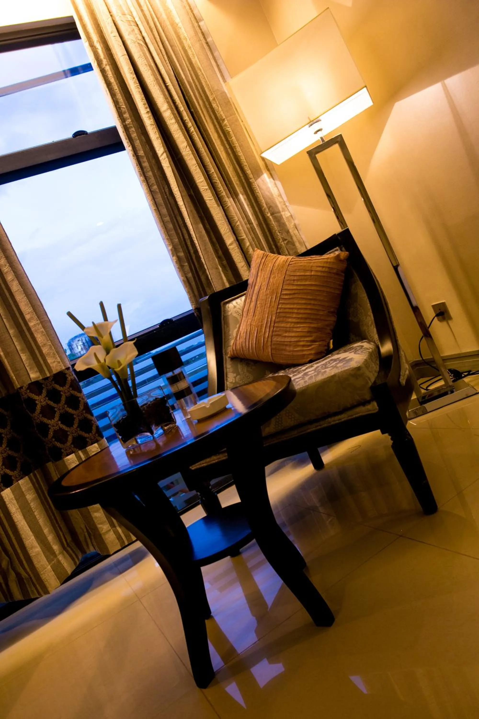 Seating area in Prime Asia Hotel