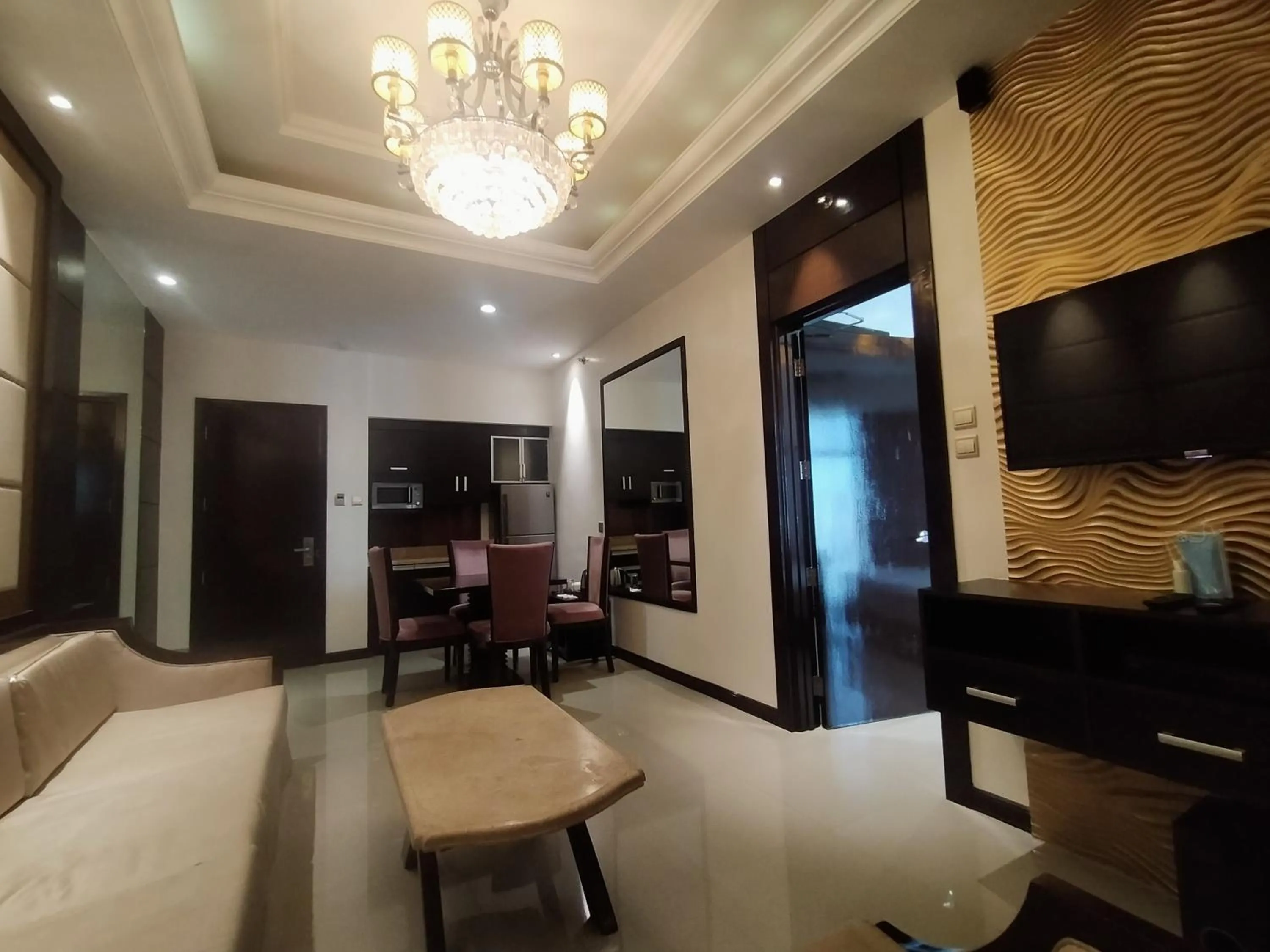 Living room in Prime Asia Hotel