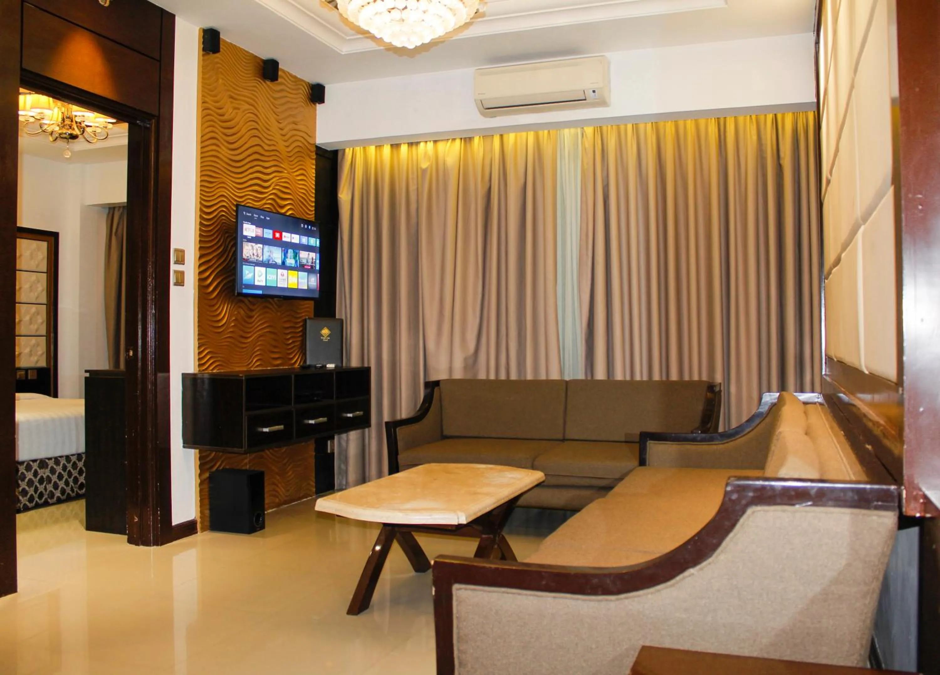 Living room in Prime Asia Hotel
