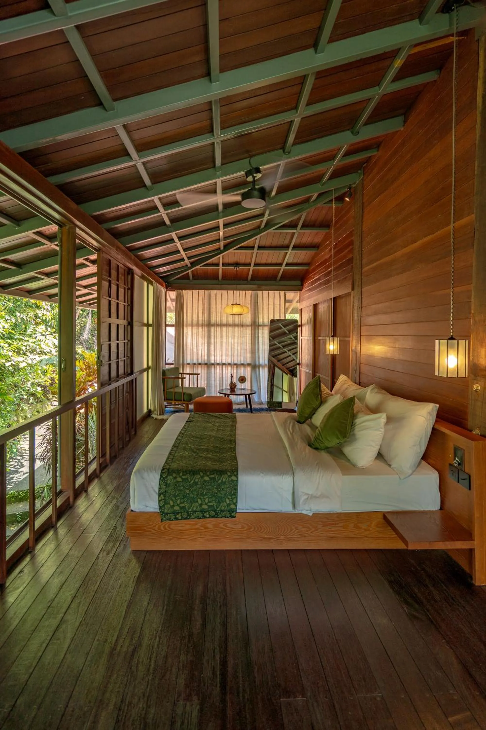 Bed in Grün Ubud