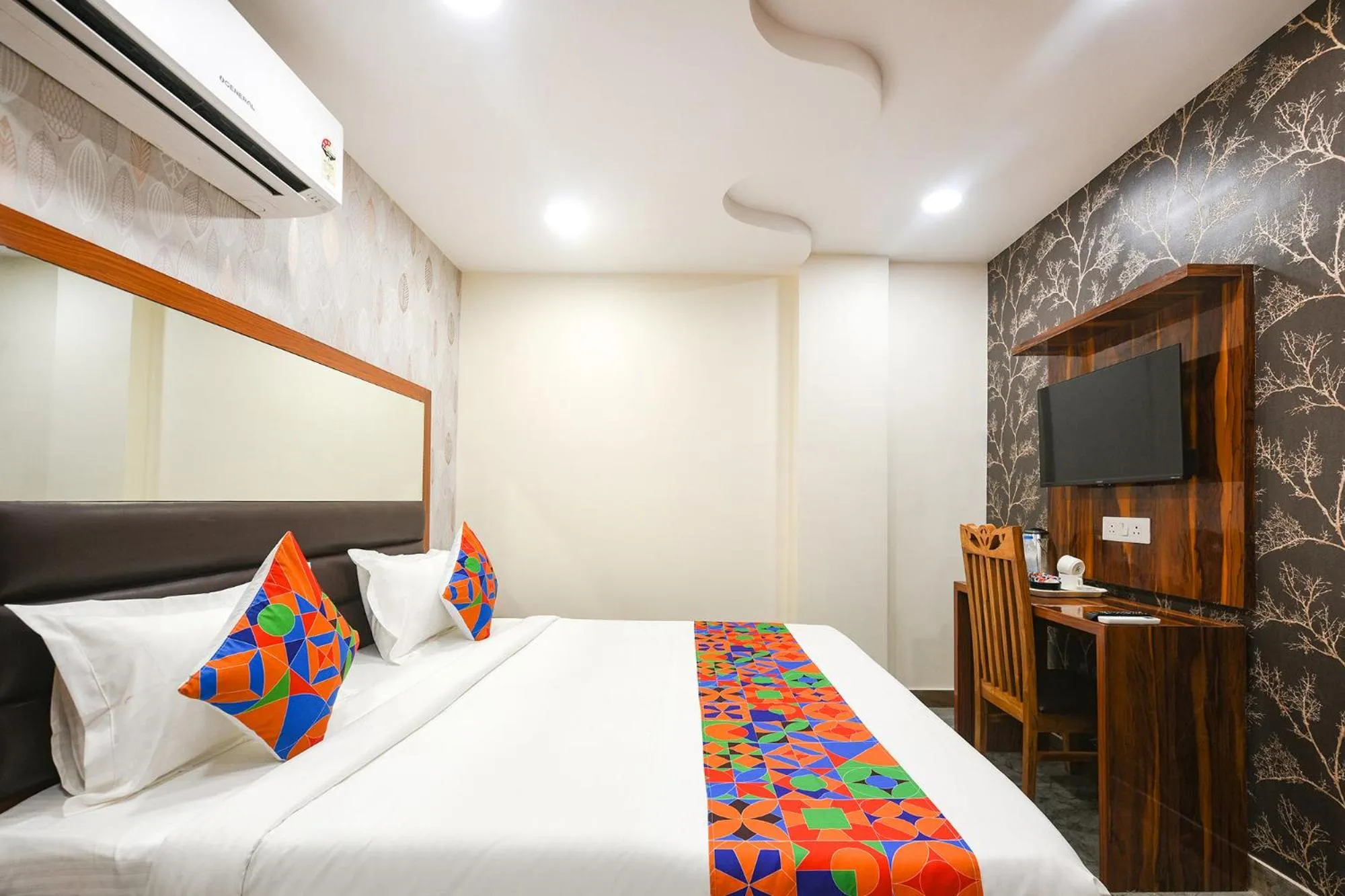 Bed in FabHotel Mona Continental - Nr Laxmi Nagar IT Hub