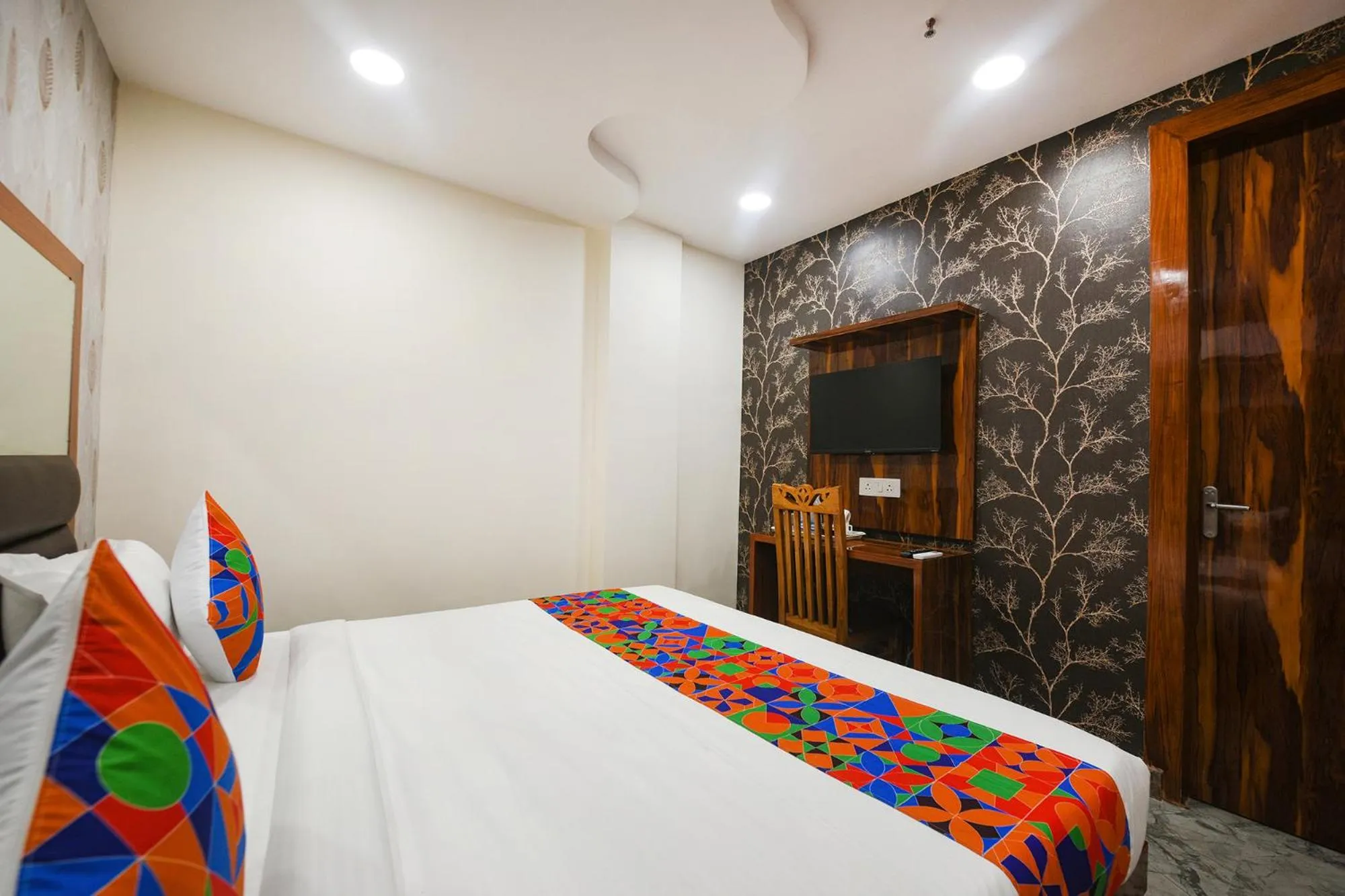 Bed in FabHotel Mona Continental - Nr Laxmi Nagar IT Hub