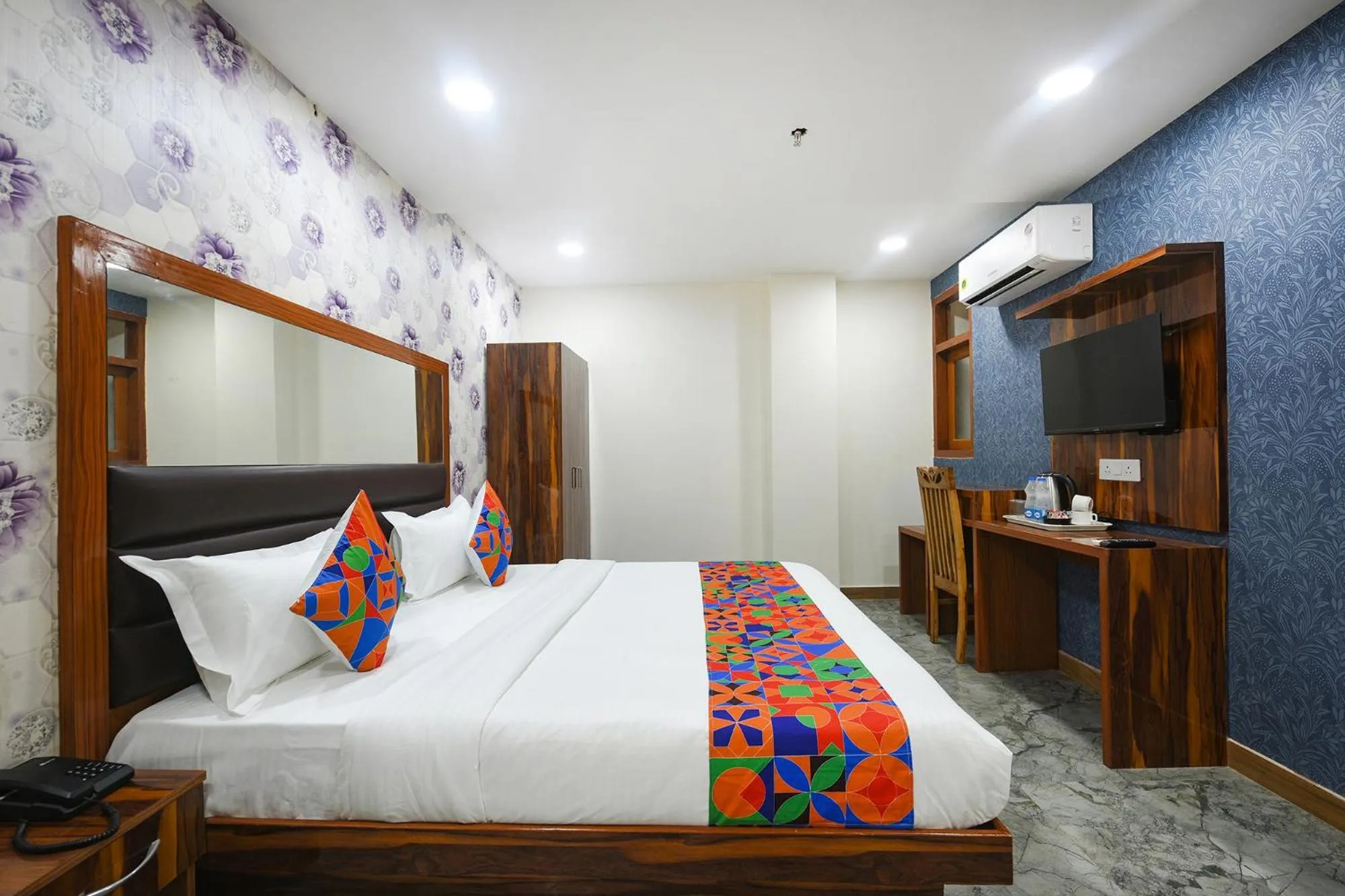 Bed in FabHotel Mona Continental - Nr Laxmi Nagar IT Hub