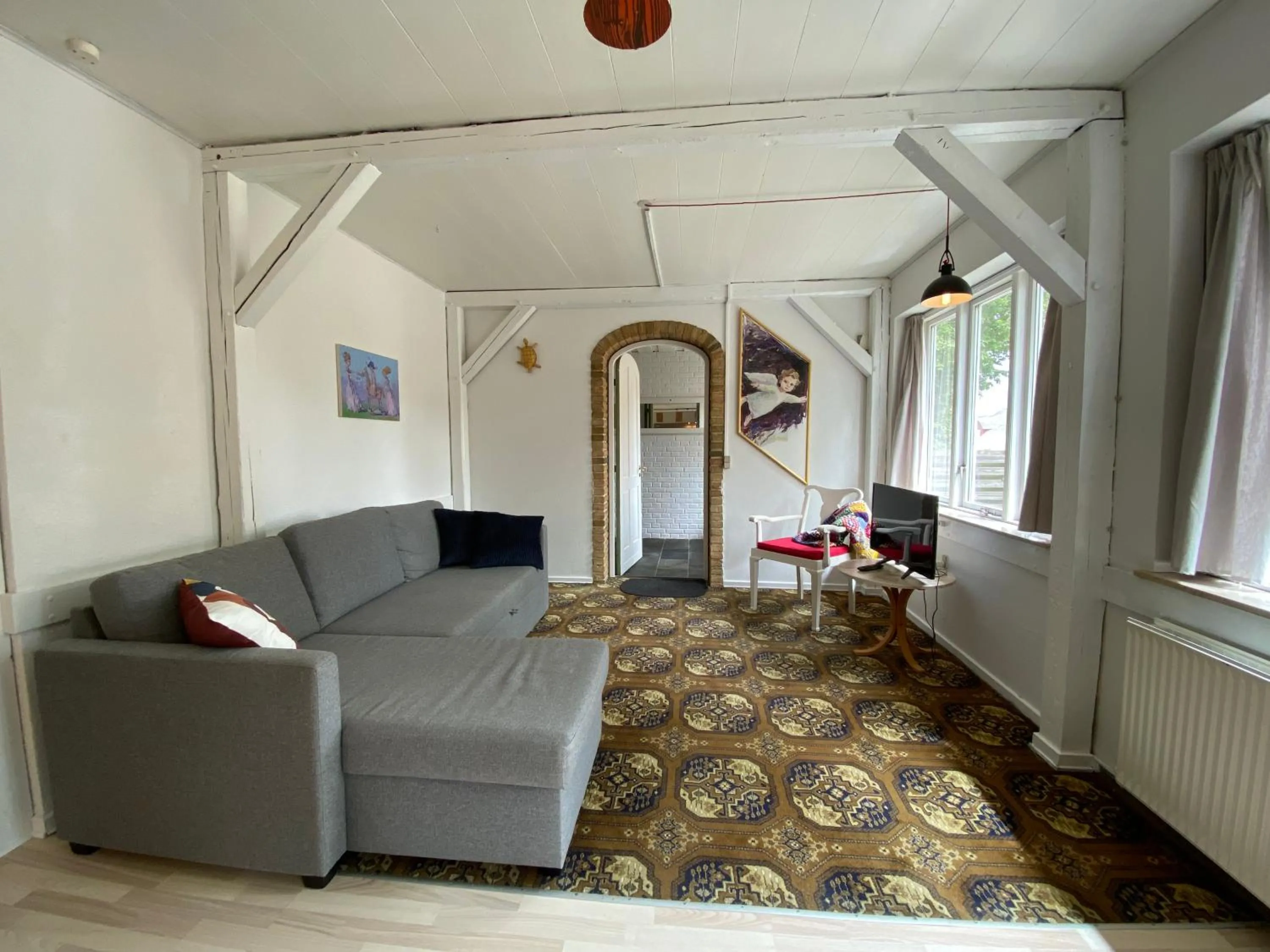 Living room in Studio Apartment in the heart of Højer