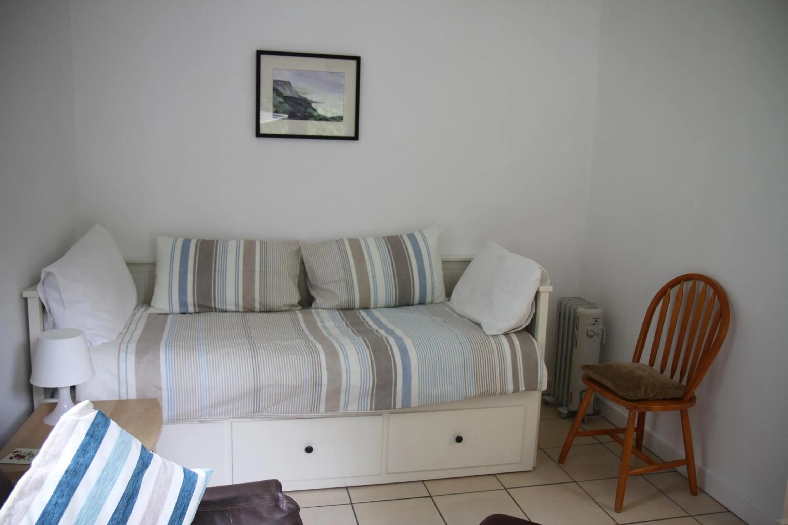 Patio, Bed in Freshwater Bay Holiday Cottages