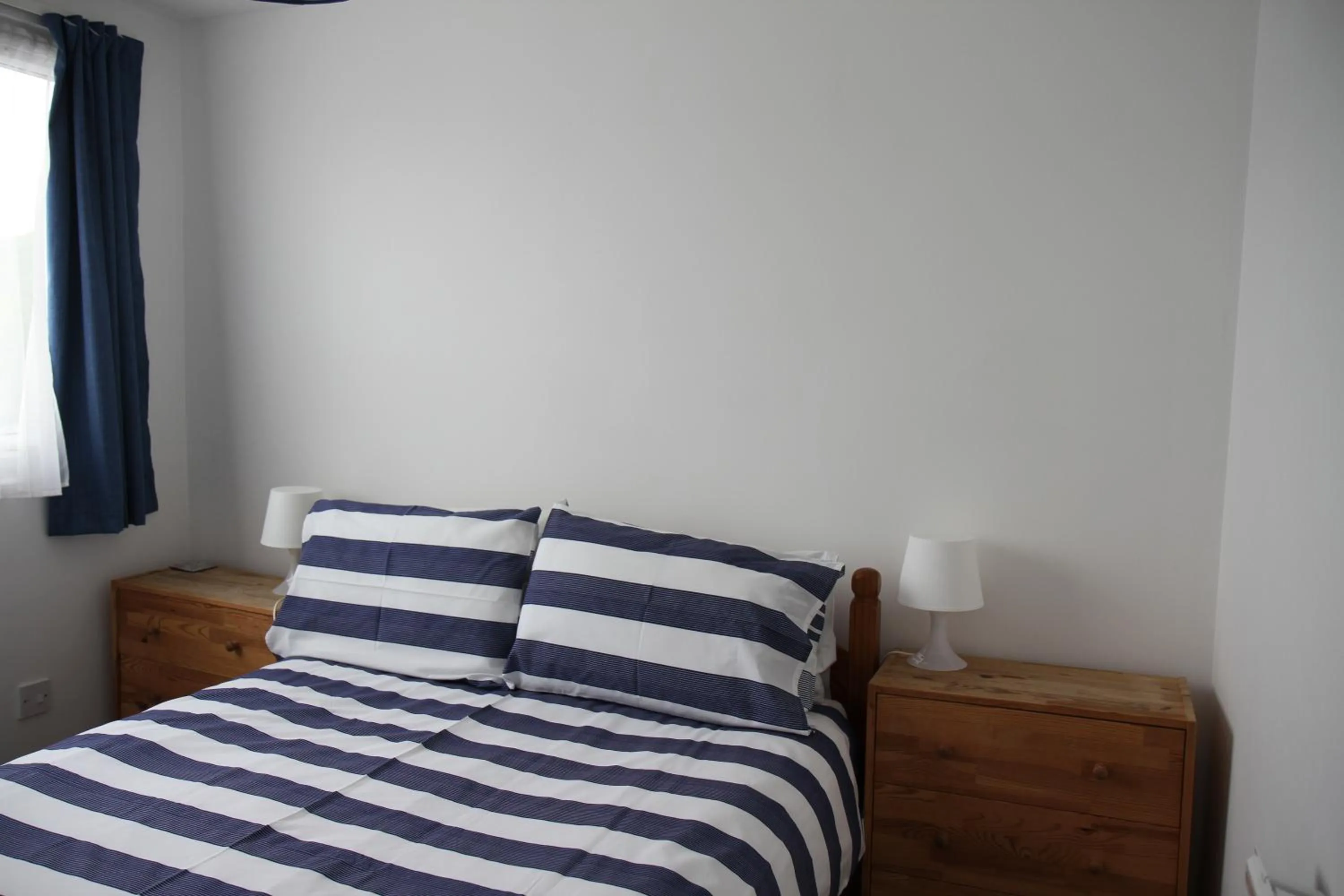 Bed in Freshwater Bay Holiday Cottages