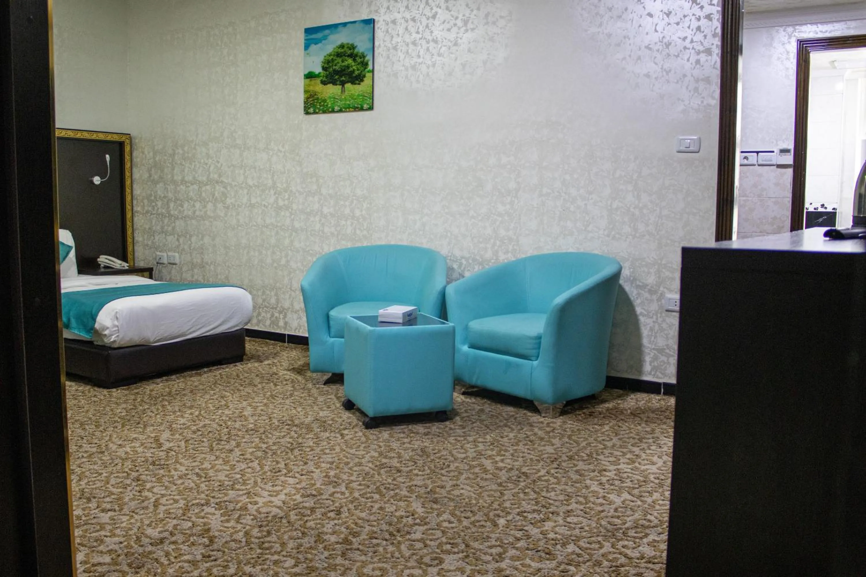 Living room, Bed in The Castle Hotel