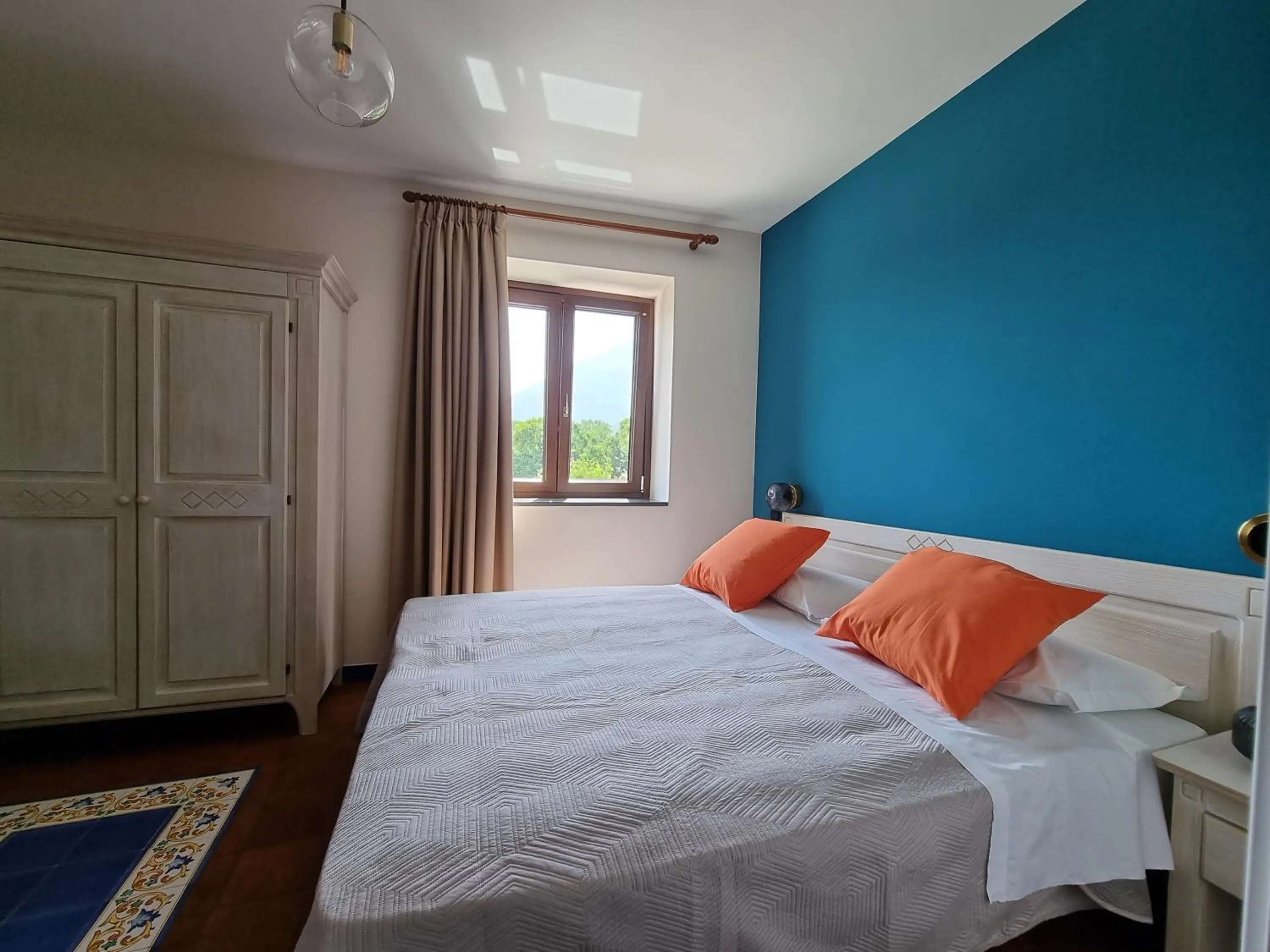 Bed in Casa Fifina Rooms