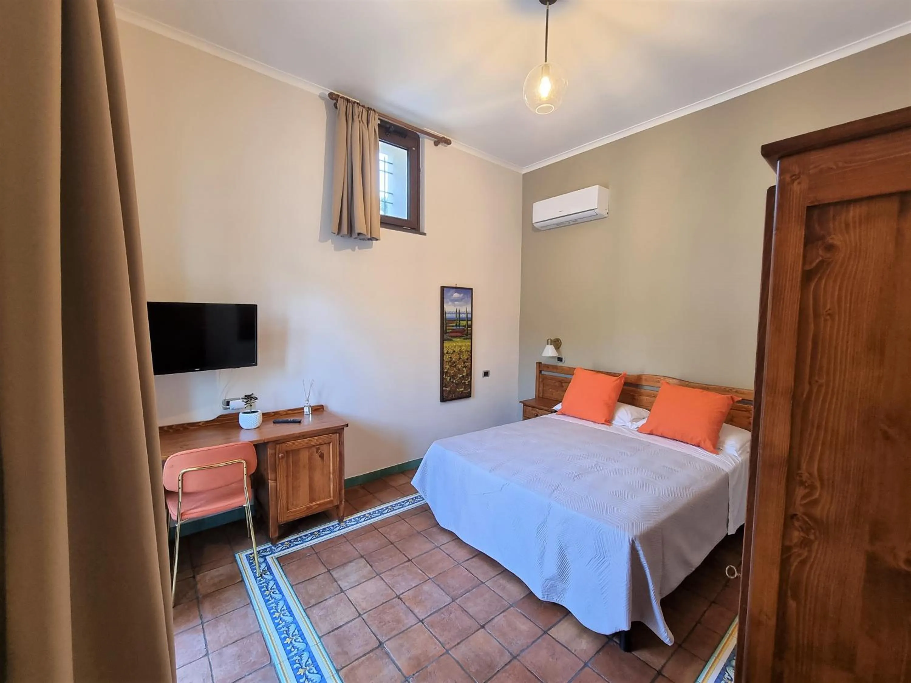 Bed in Casa Fifina Rooms