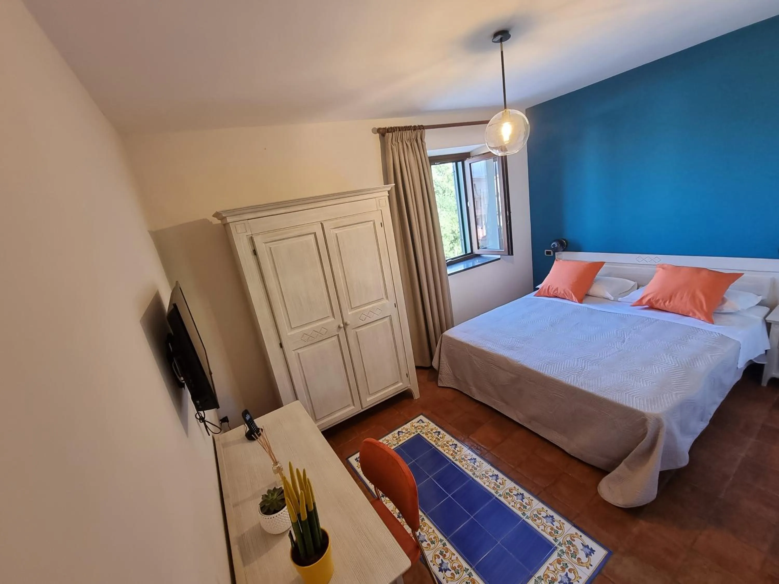 Bed in Casa Fifina Rooms