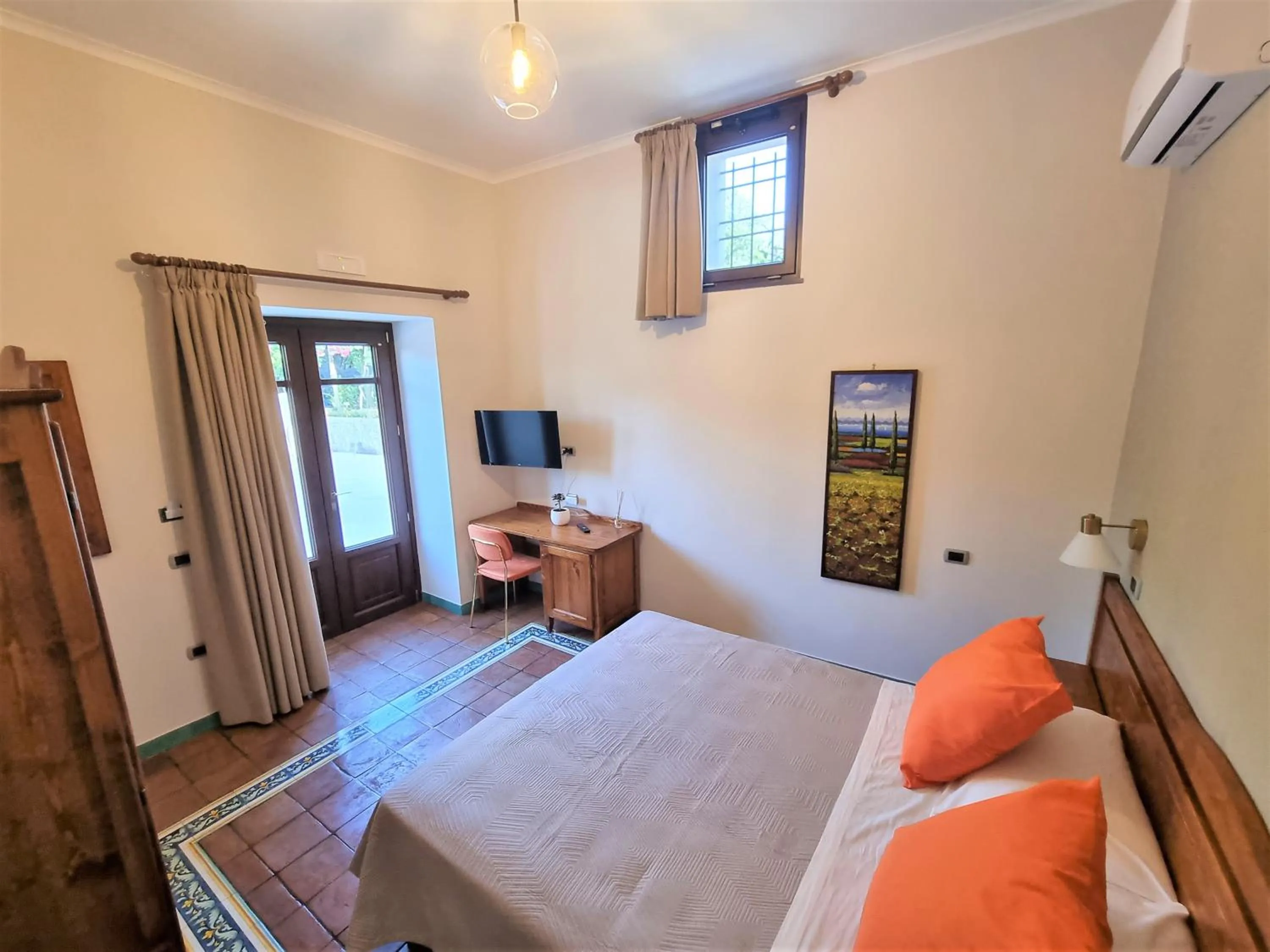 Bed in Casa Fifina Rooms