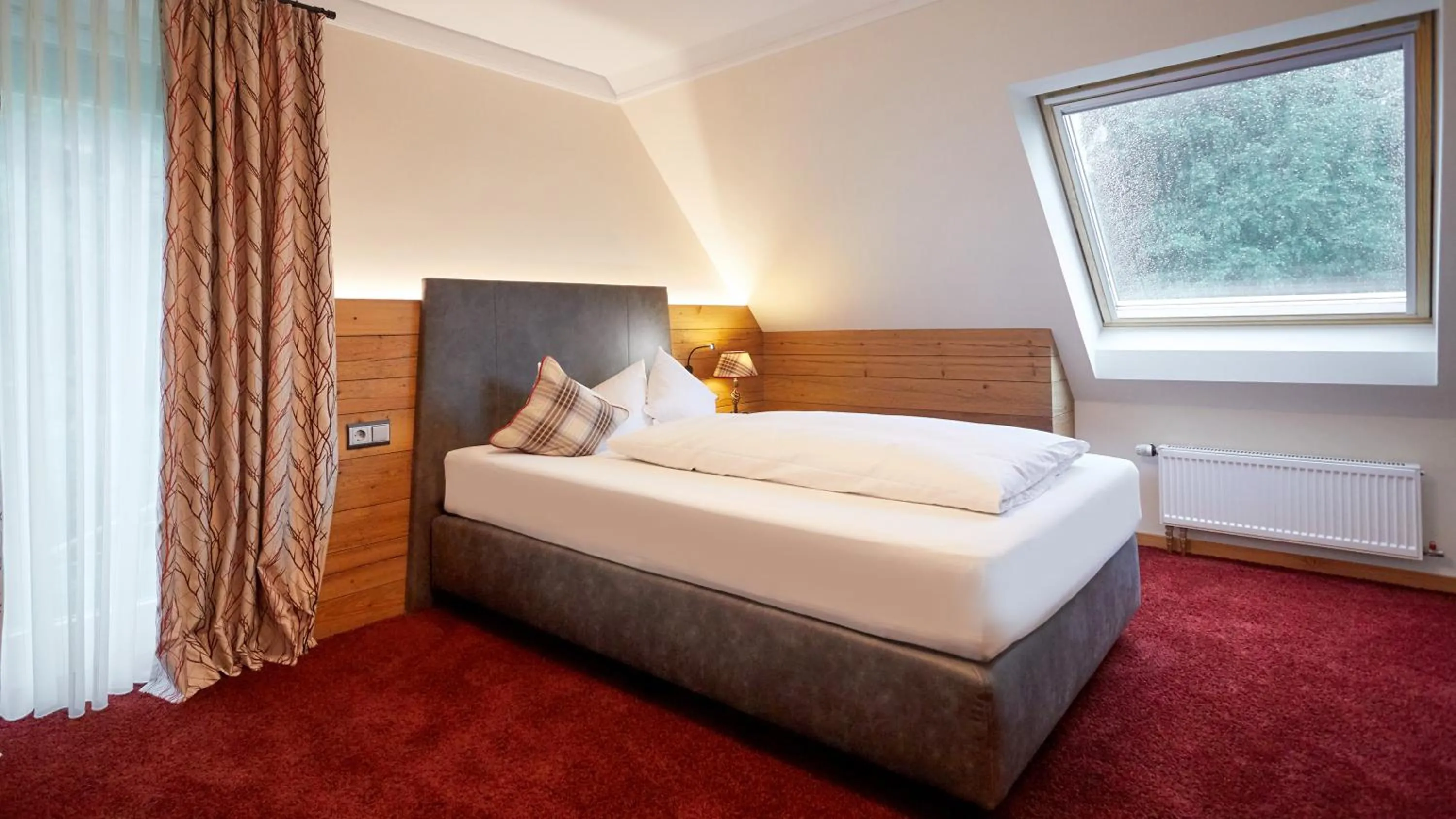 Photo of the whole room, Bed in Romantik Hotel Rindenmühle