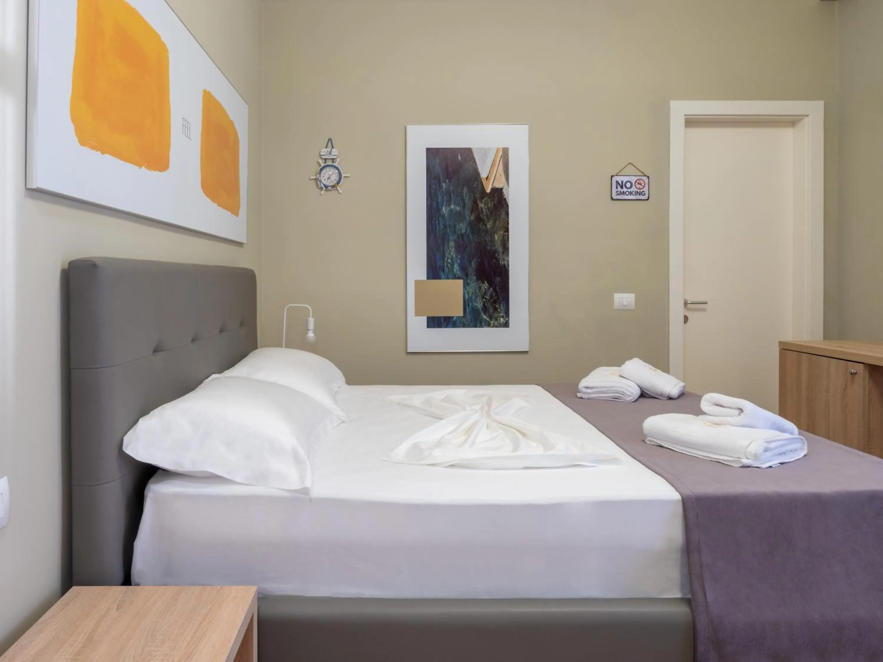Bed in Nia Boutique Hotel by Rapo's Resort