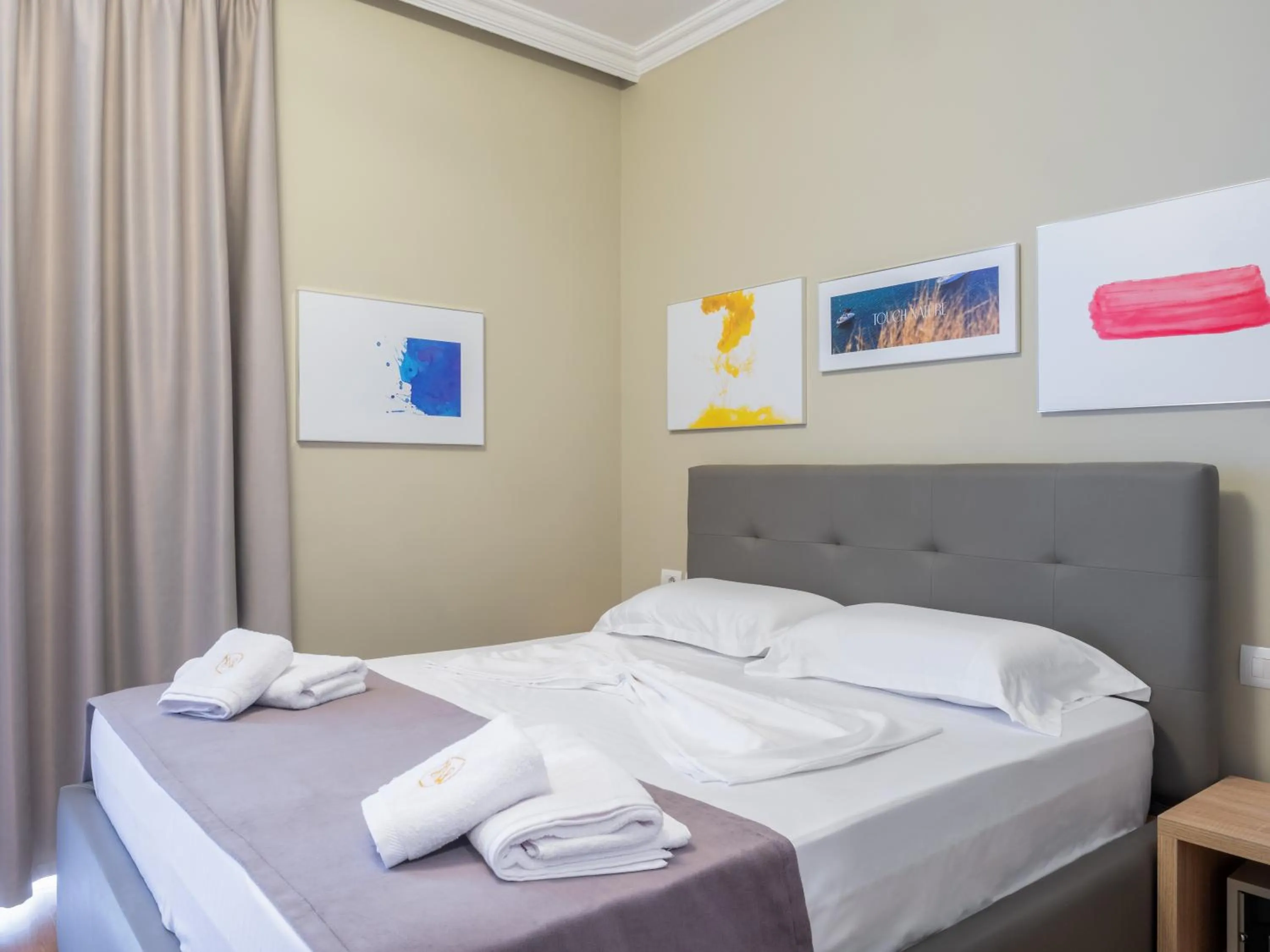 Bed in Nia Boutique Hotel by Rapo's Resort