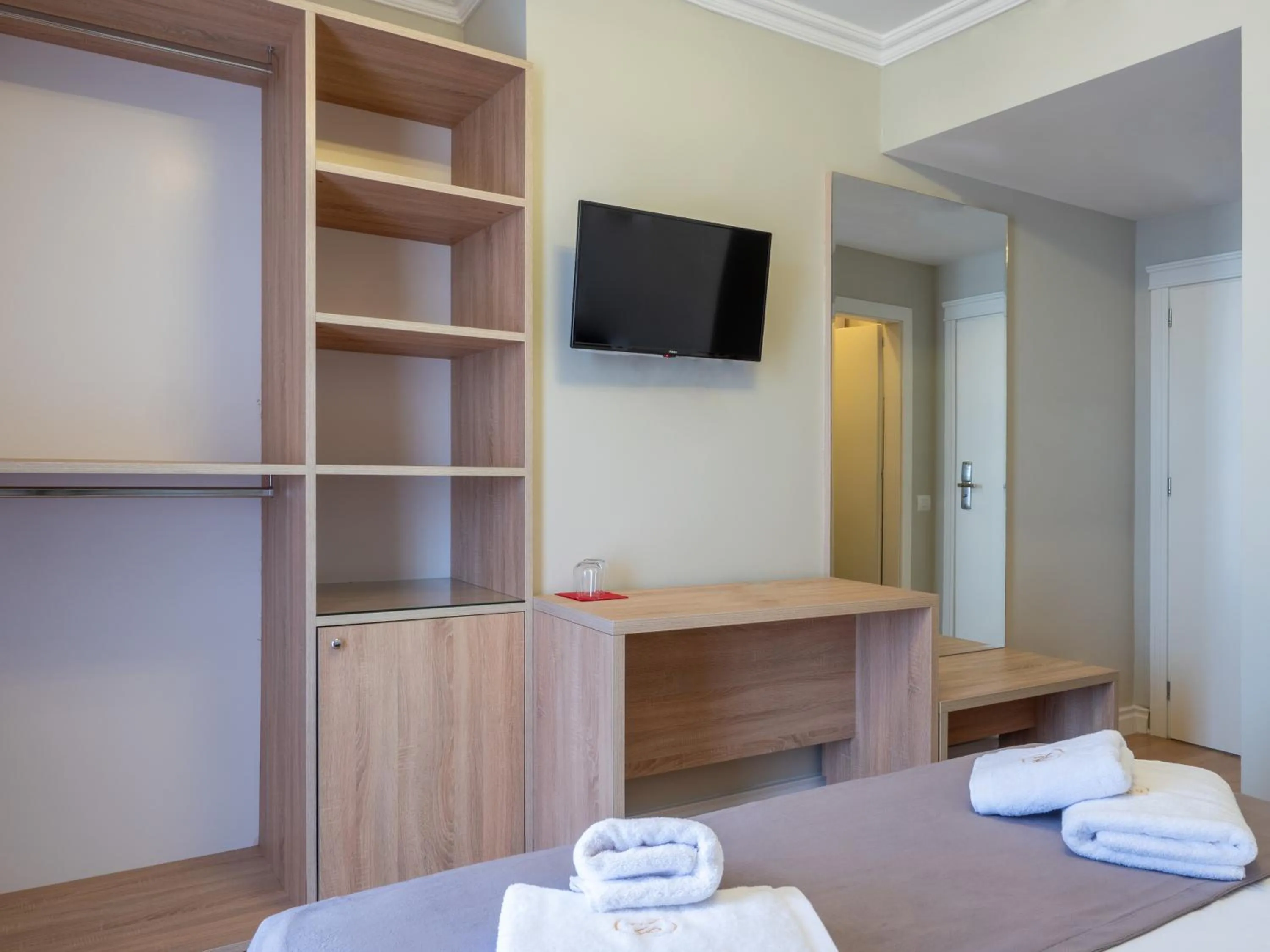Bed in Nia Boutique Hotel by Rapo's Resort