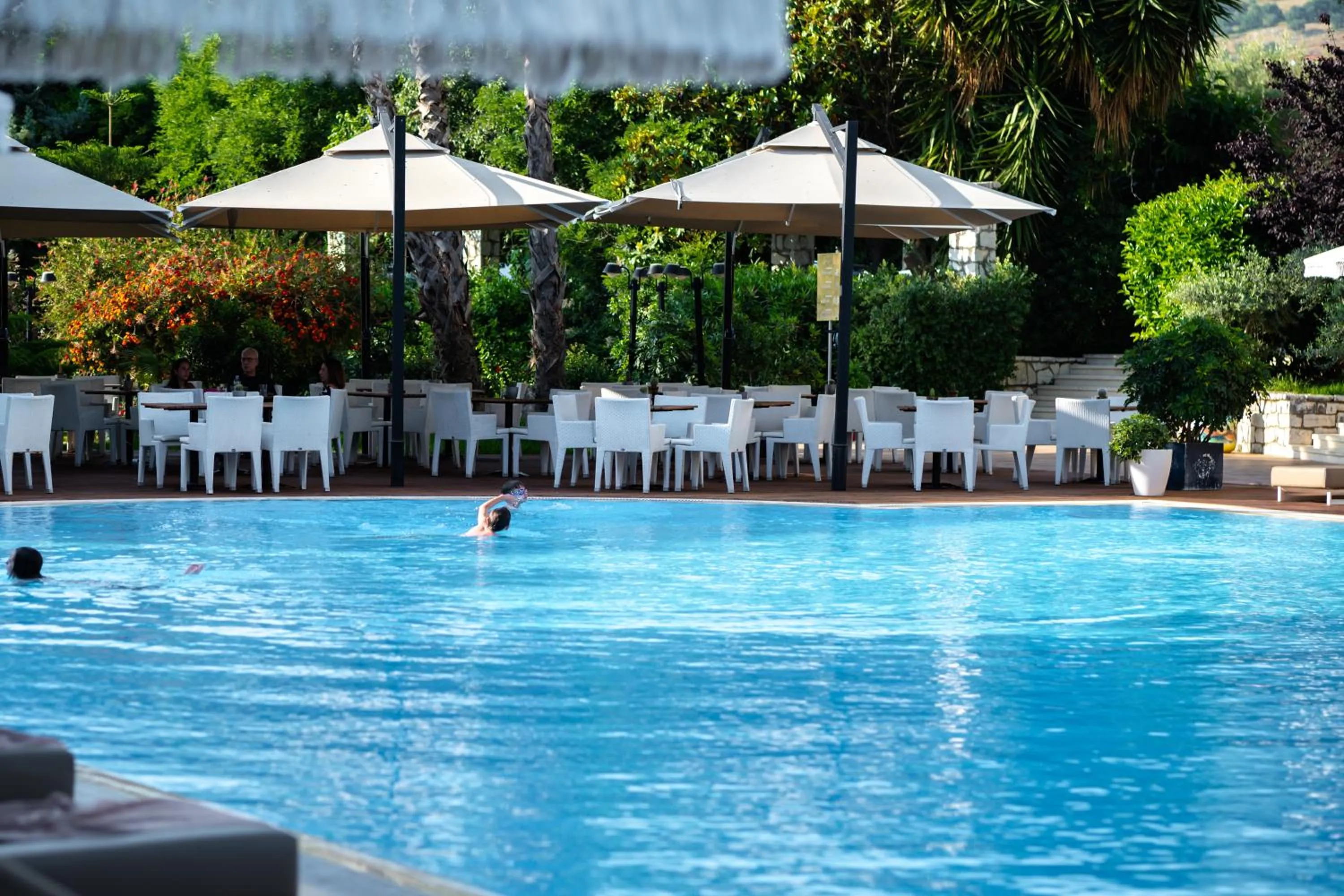 People in Nia Boutique Hotel by Rapo's Resort