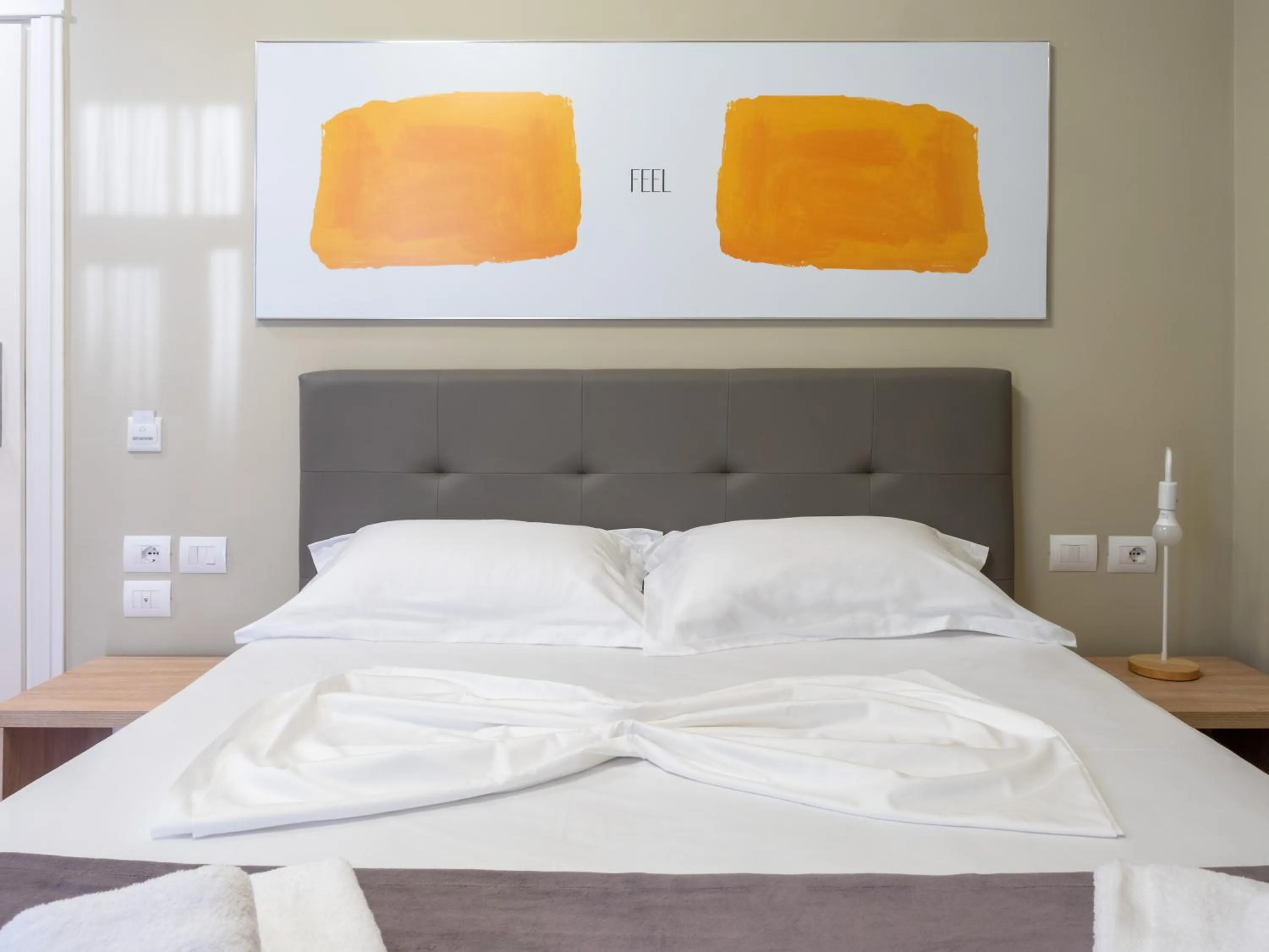 Bed in Nia Boutique Hotel by Rapo's Resort