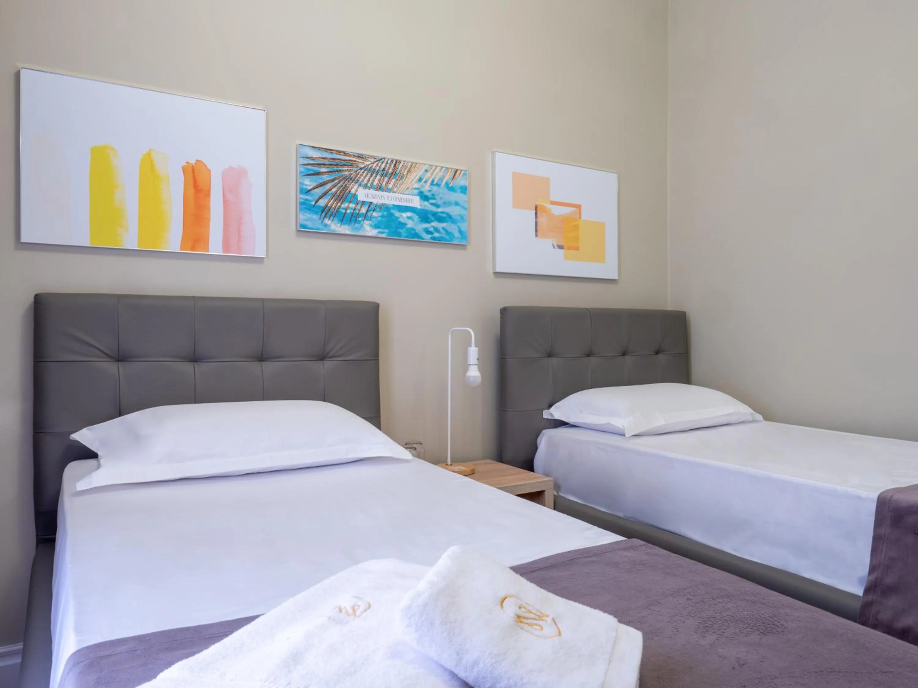 Bed in Nia Boutique Hotel by Rapo's Resort